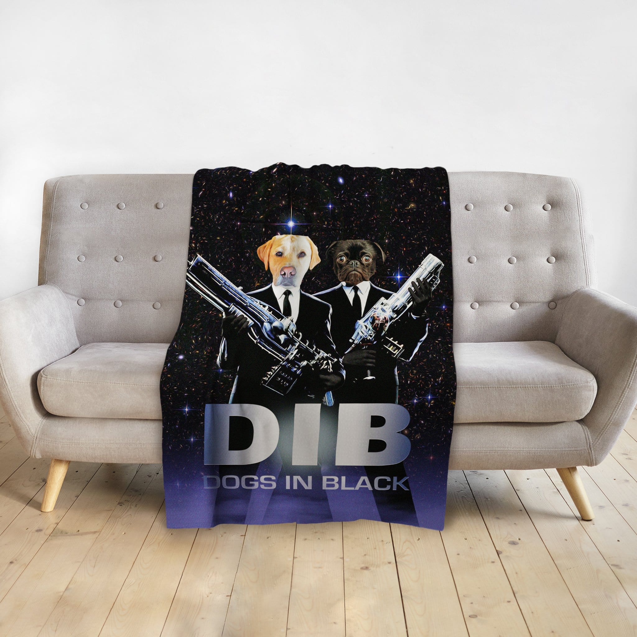 Personalized 'Dogs in Black' pet blanket featuring two dogs in suits holding weapons, draped on a sofa.