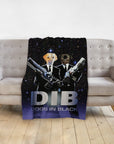 Personalized 'Dogs in Black' pet blanket featuring two dogs in suits holding weapons, draped on a sofa.