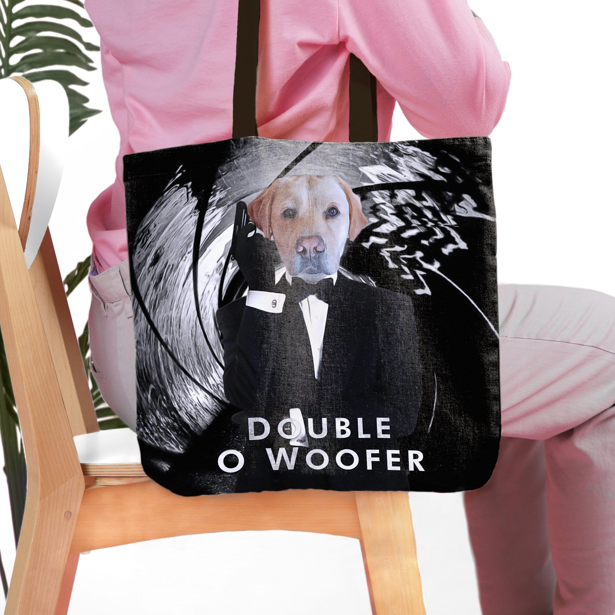 Personalized black tote bag with a custom Labrador dog portrait in a 'Double O Woofer' spy suit design.