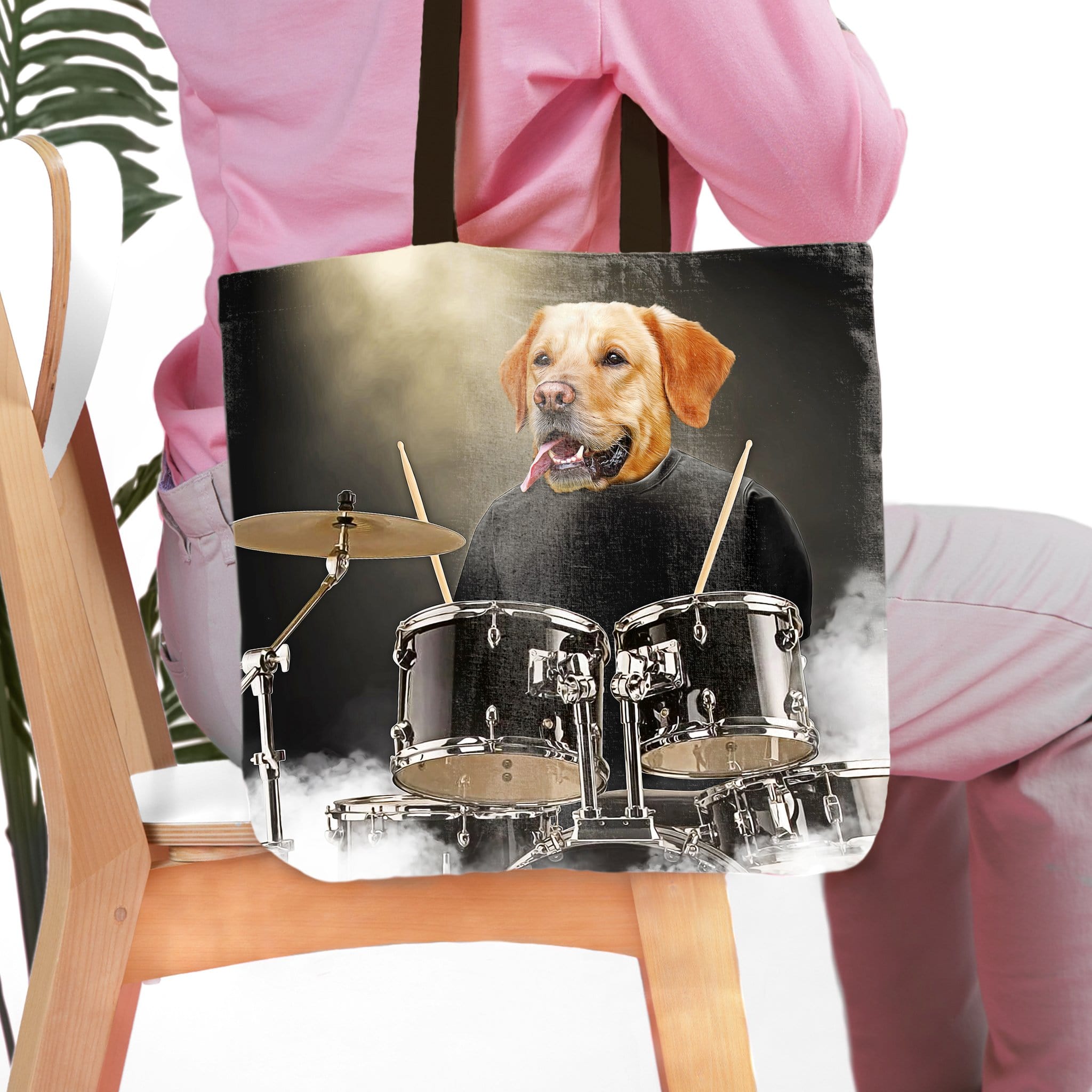 Personalized tote bag with a custom pet portrait of a dog playing drums.