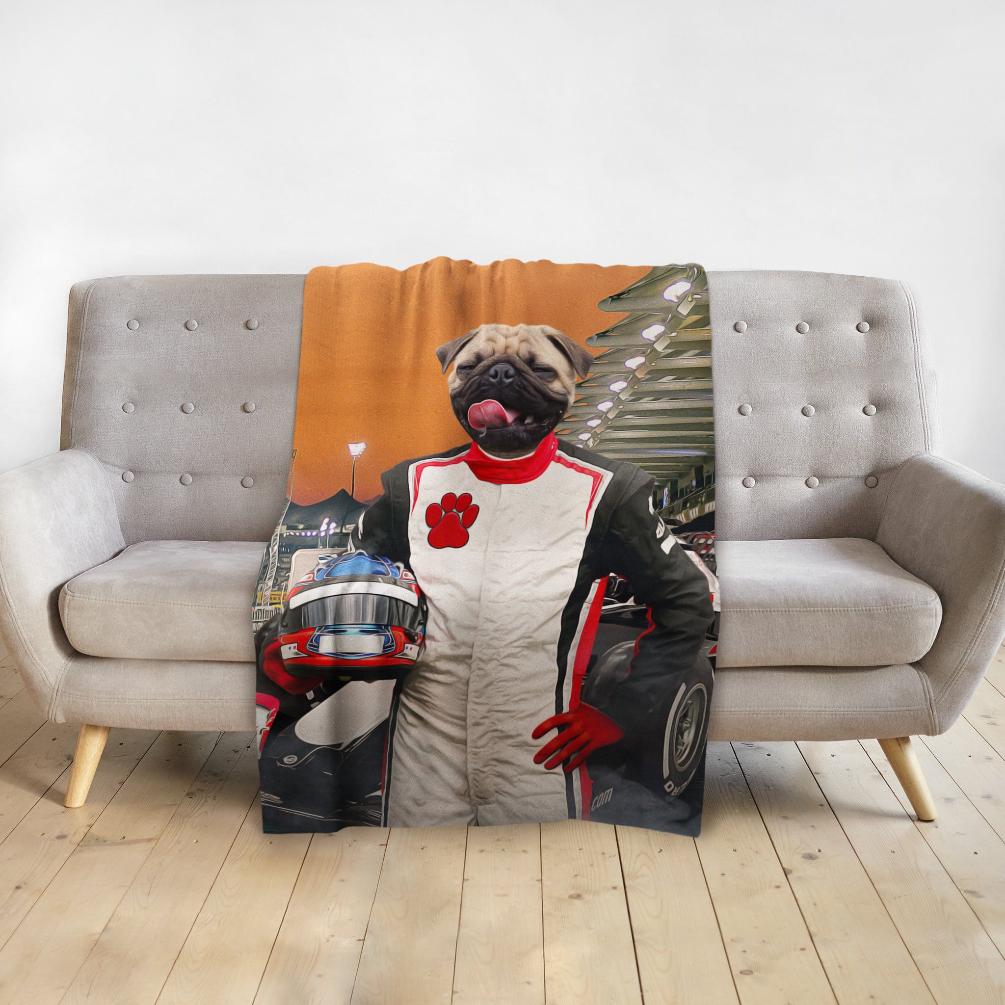 Personalized pet blanket with a pug in a race car driver suit at a track.