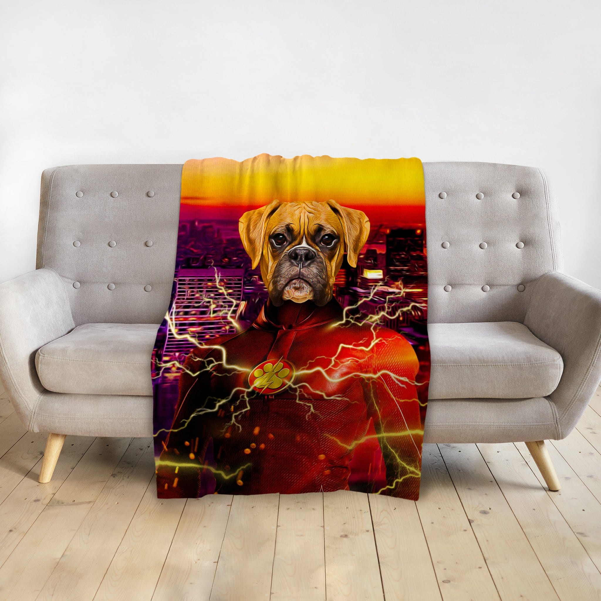 Custom personalized pet blanket with a Boxer dog portrait as The Flash, draped over a gray couch.