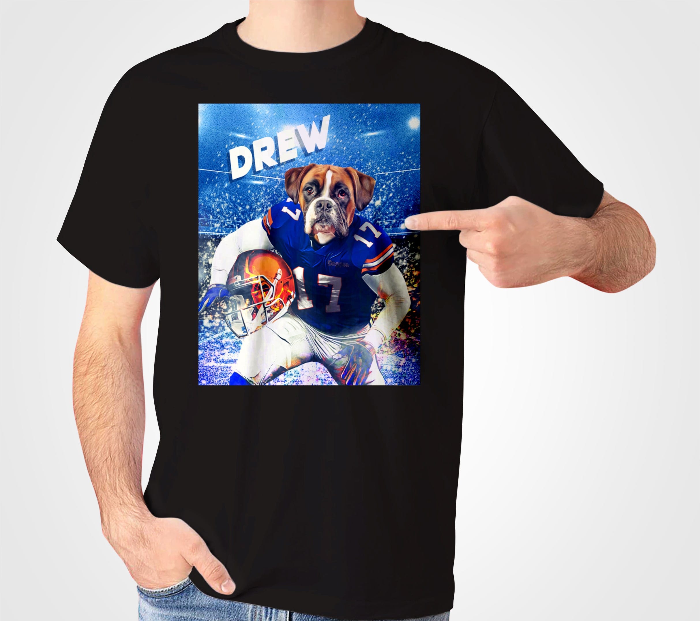 Black Gildan tee with a personalized boxer dog in a blue football uniform, holding a helmet, against a stadium backdrop.