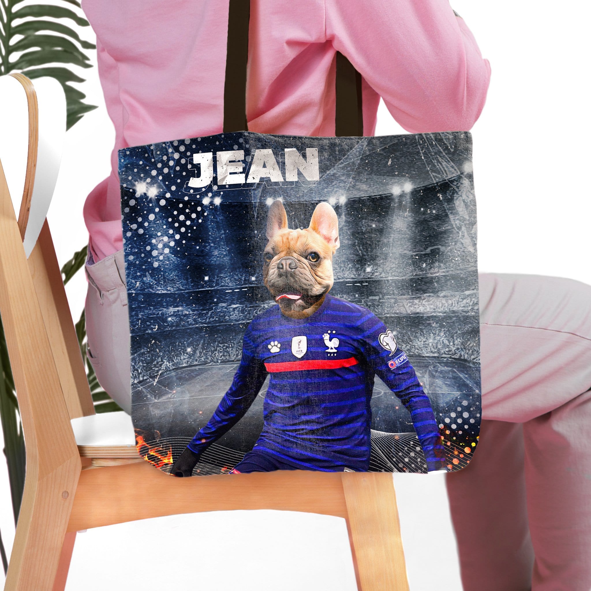 Personalized tote bag with a French Bulldog pet portrait in a blue soccer uniform.