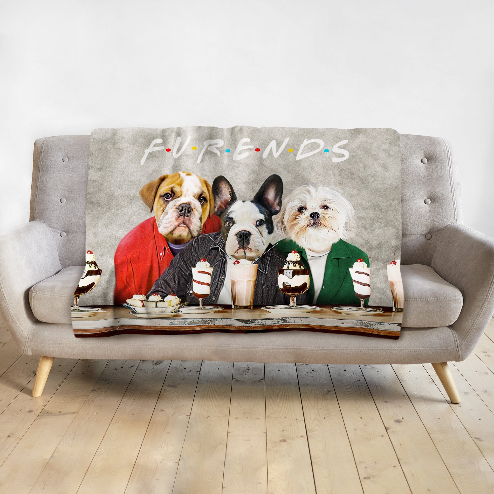 Personalized Furends blanket with three dogs in Doggovinci portraits, sitting at a table with sundaes.