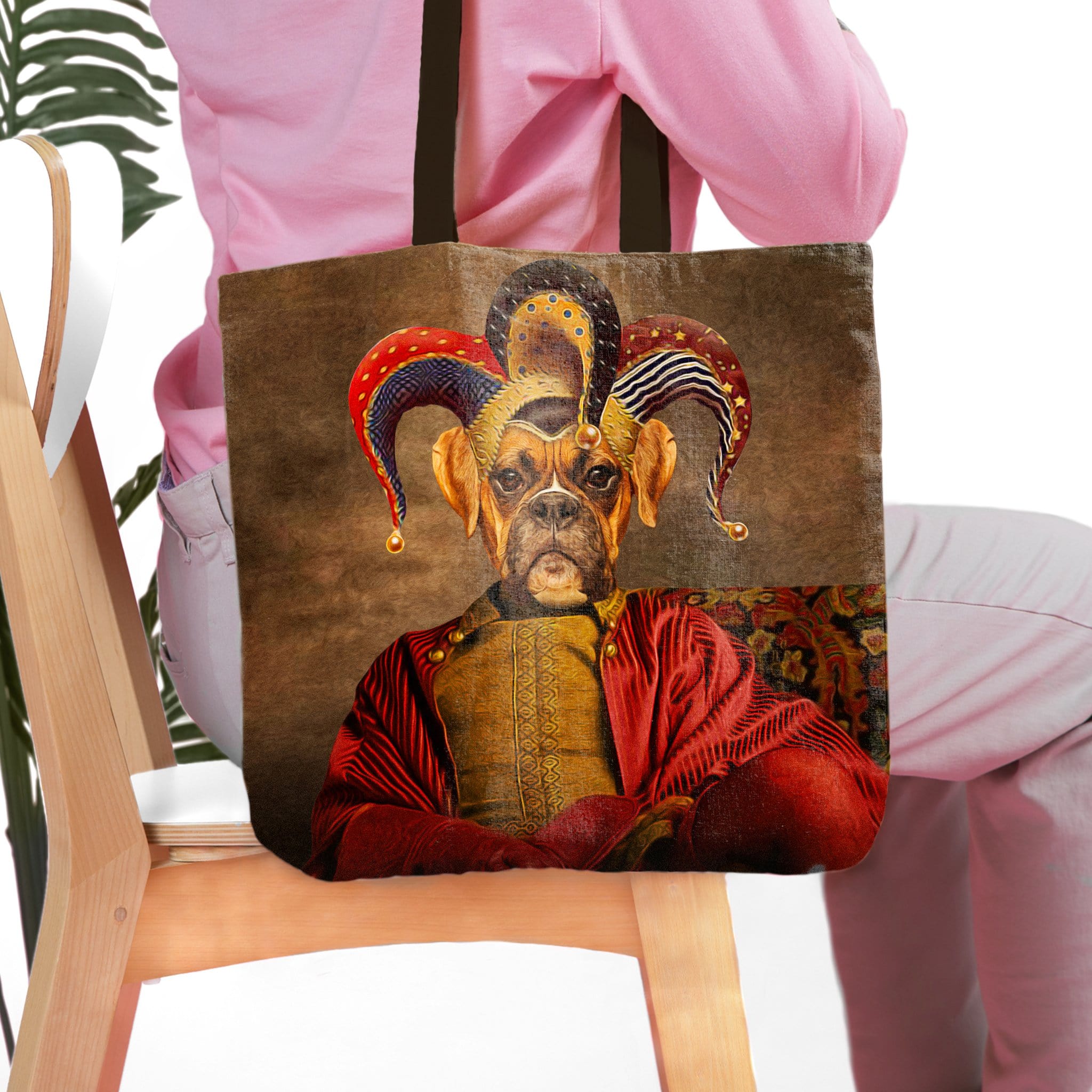 Personalized tote bag with a custom renaissance-style portrait of a dog in a jester hat.