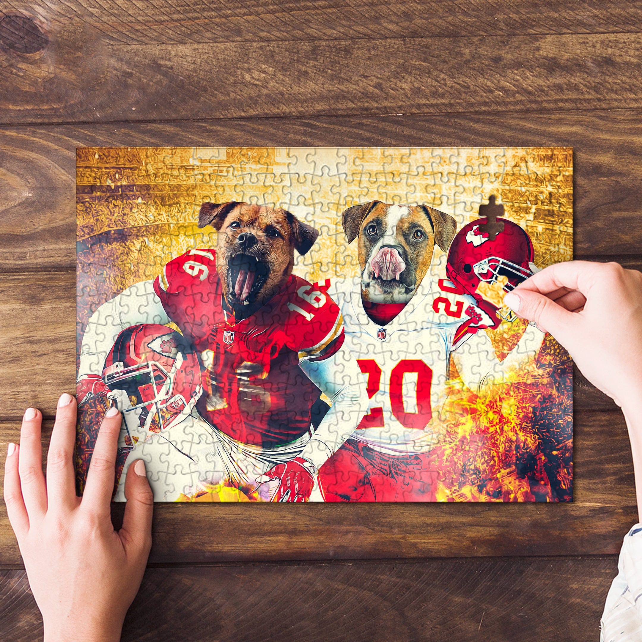 Personalized 2 pet puzzle featuring dogs in Kansas City football uniforms, being assembled on wood.