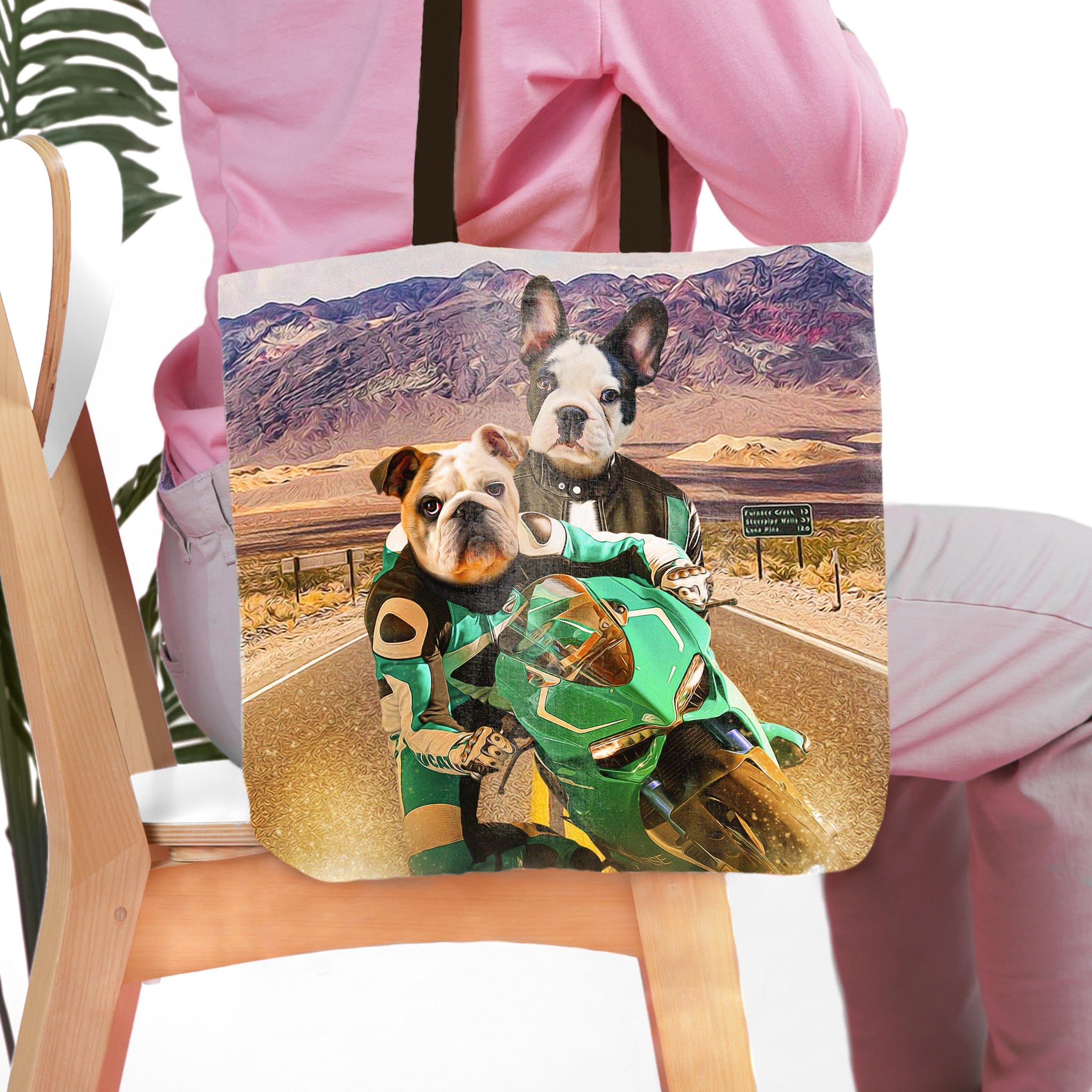 Personalized pet portrait tote bag featuring two dogs on a green motorcycle in a desert landscape.