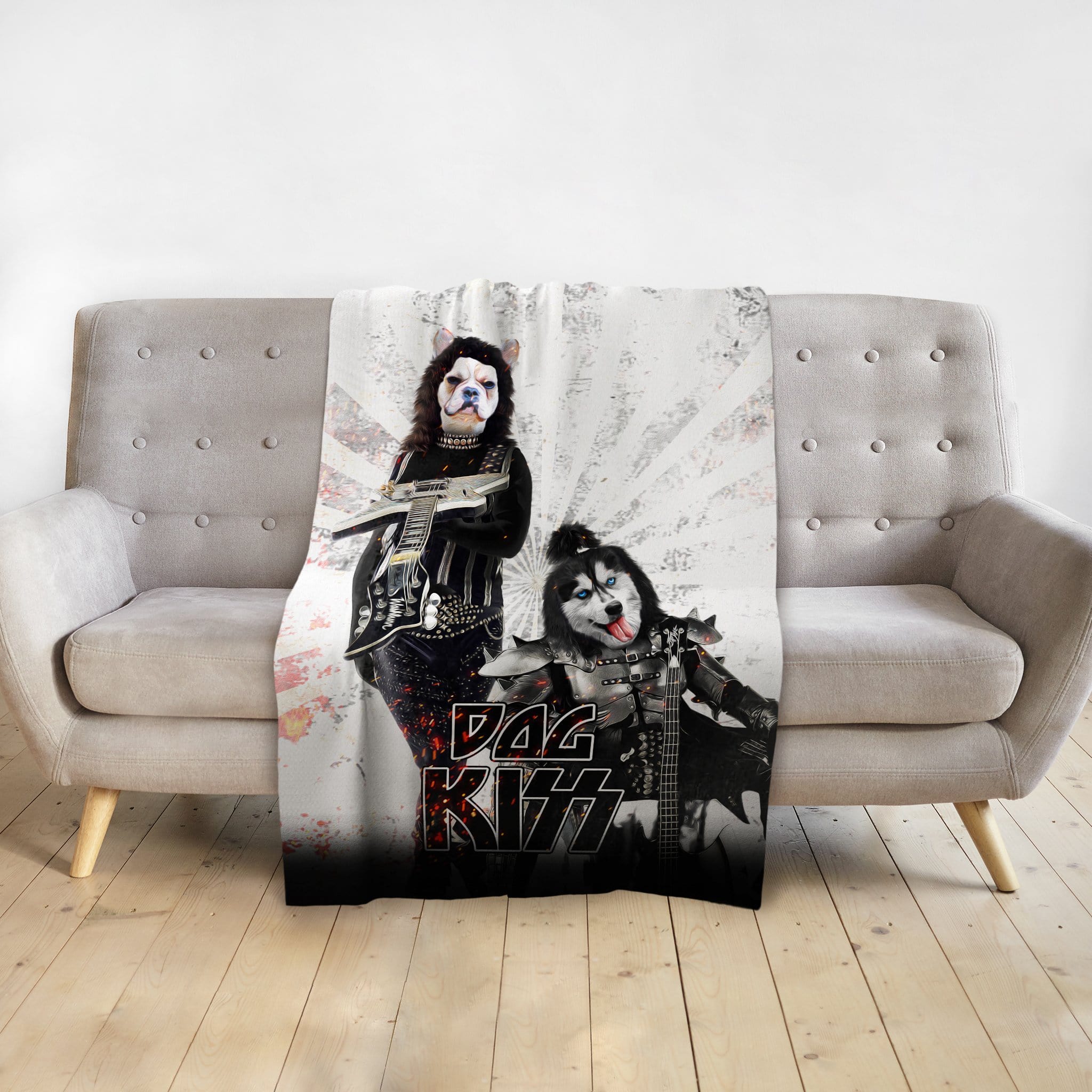 Personalized 'Kiss Doggos' blanket featuring two pets as rock stars on a gray couch.