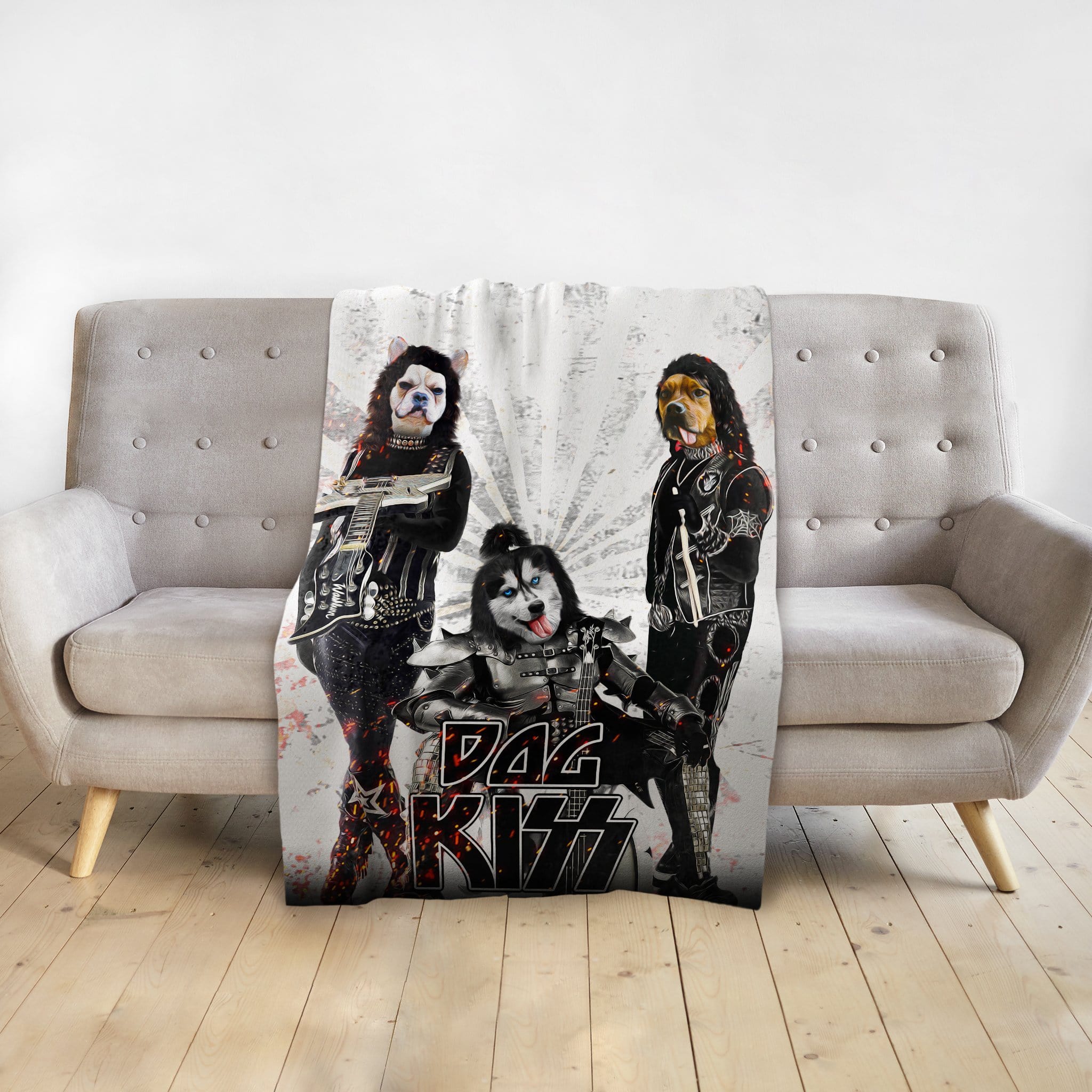 Personalized 3-pet blanket with dogs in Kiss rock band costumes, white background, on a gray sofa.