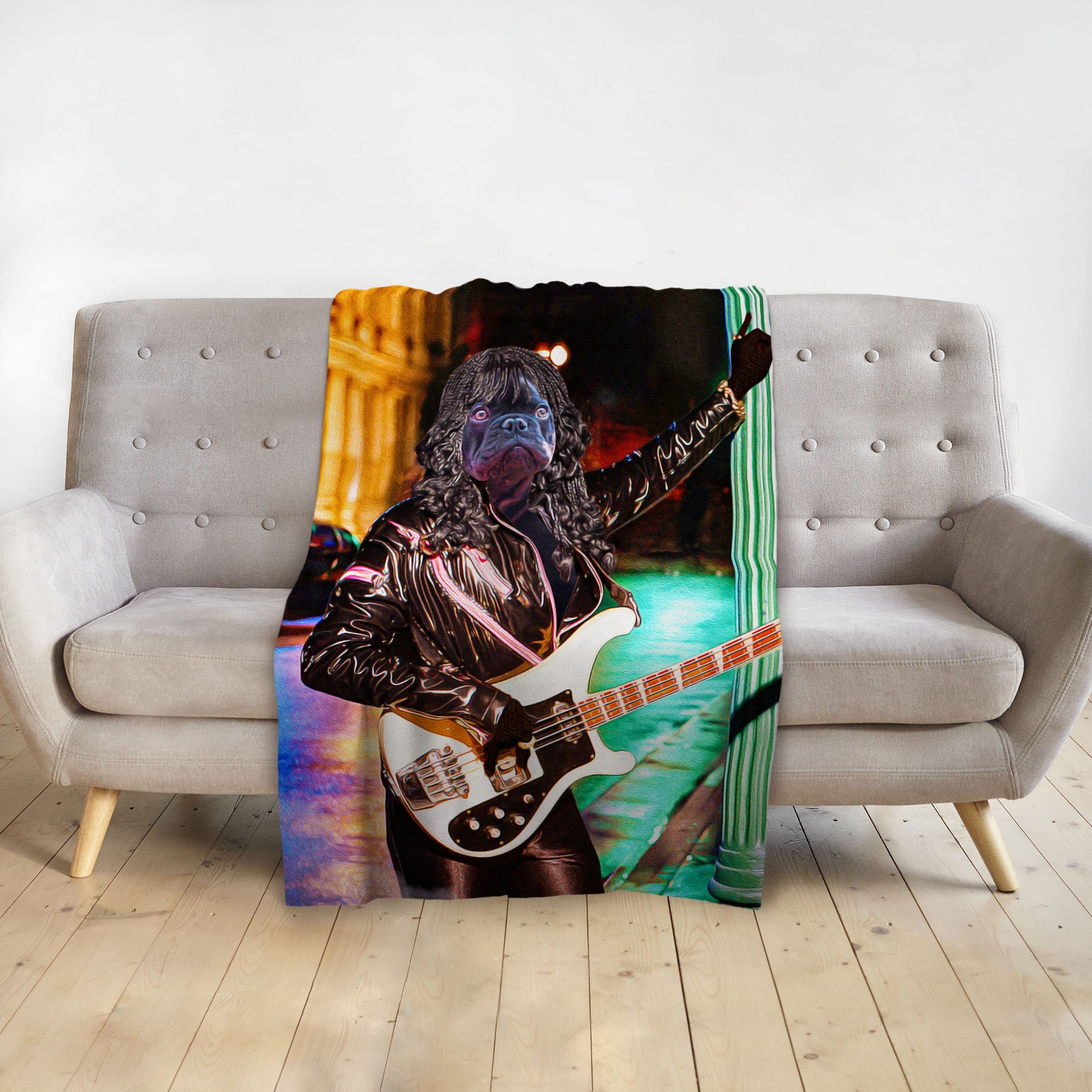 Personalized pet blanket with a Doggovinci portrait of a pug as a rockstar playing bass.