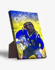 Personalized pet standing canvas featuring a black dog in a blue and yellow football uniform, holding a helmet.