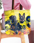Personalized tote bag with two dogs in Michigan football uniforms, yellow and black design.