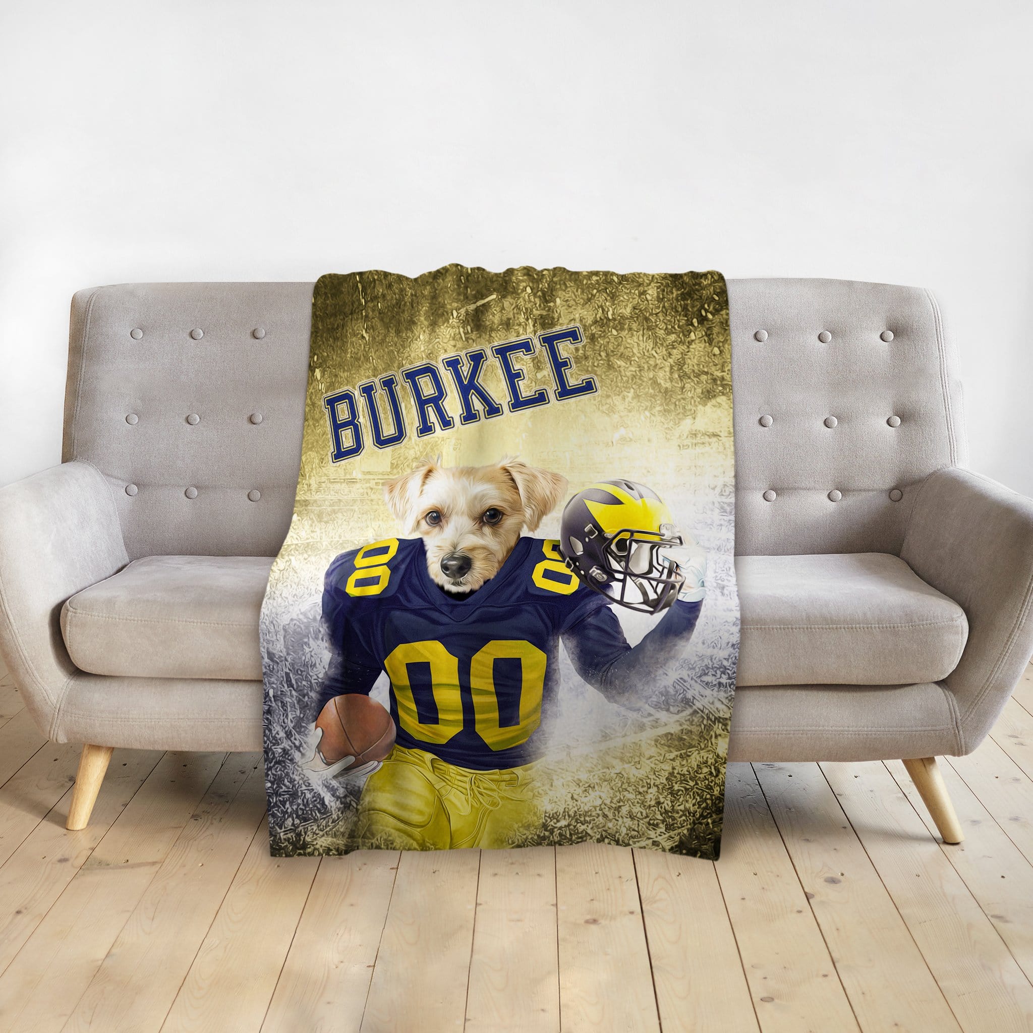Personalized pet blanket with a Doggovinci portrait of a dog in a Michigan football uniform.