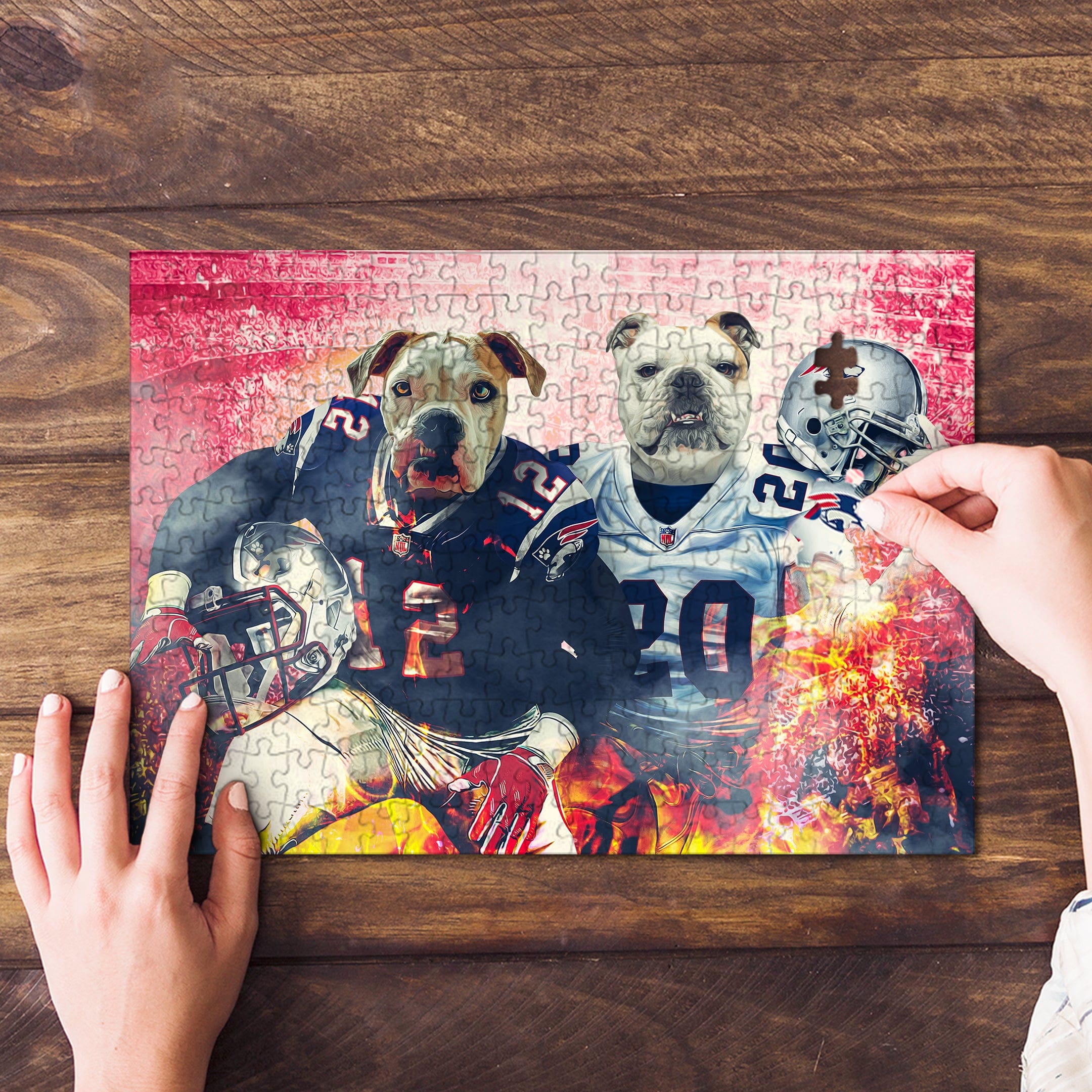 Personalized 2-pet puzzle featuring dogs in New England football uniforms, being assembled on a wood table.