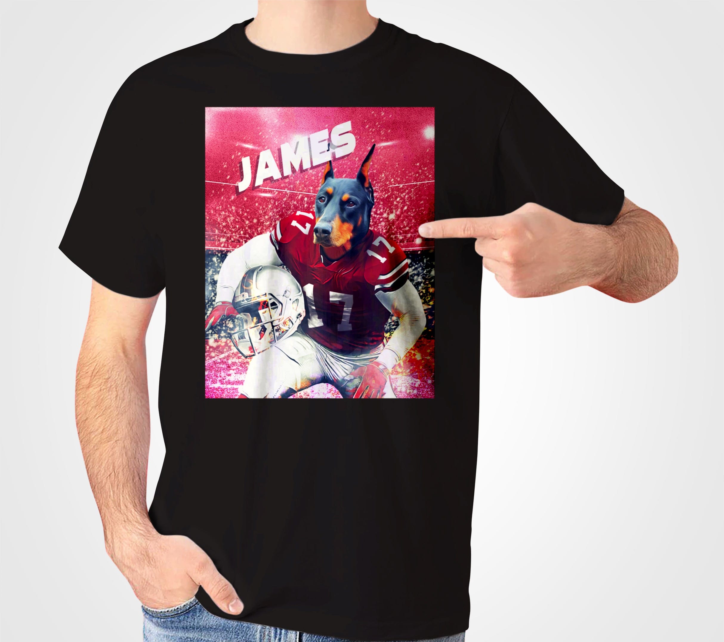 Black Gildan t-shirt with a personalized graphic of a Doberman dog in a red football uniform, holding a helmet, with "JAMES" above.