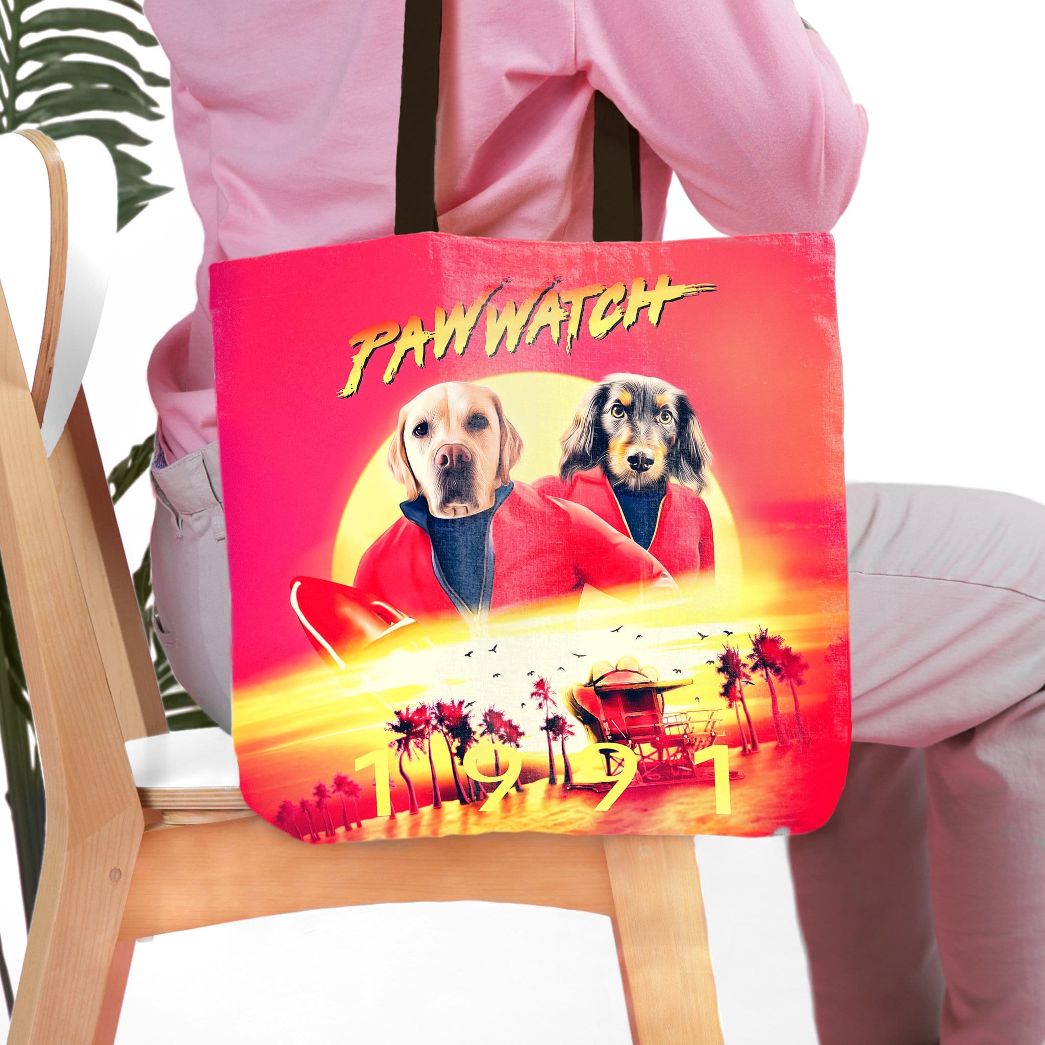 Personalized Paw Watch 1991 tote bag with custom dog portraits in a beach scene.