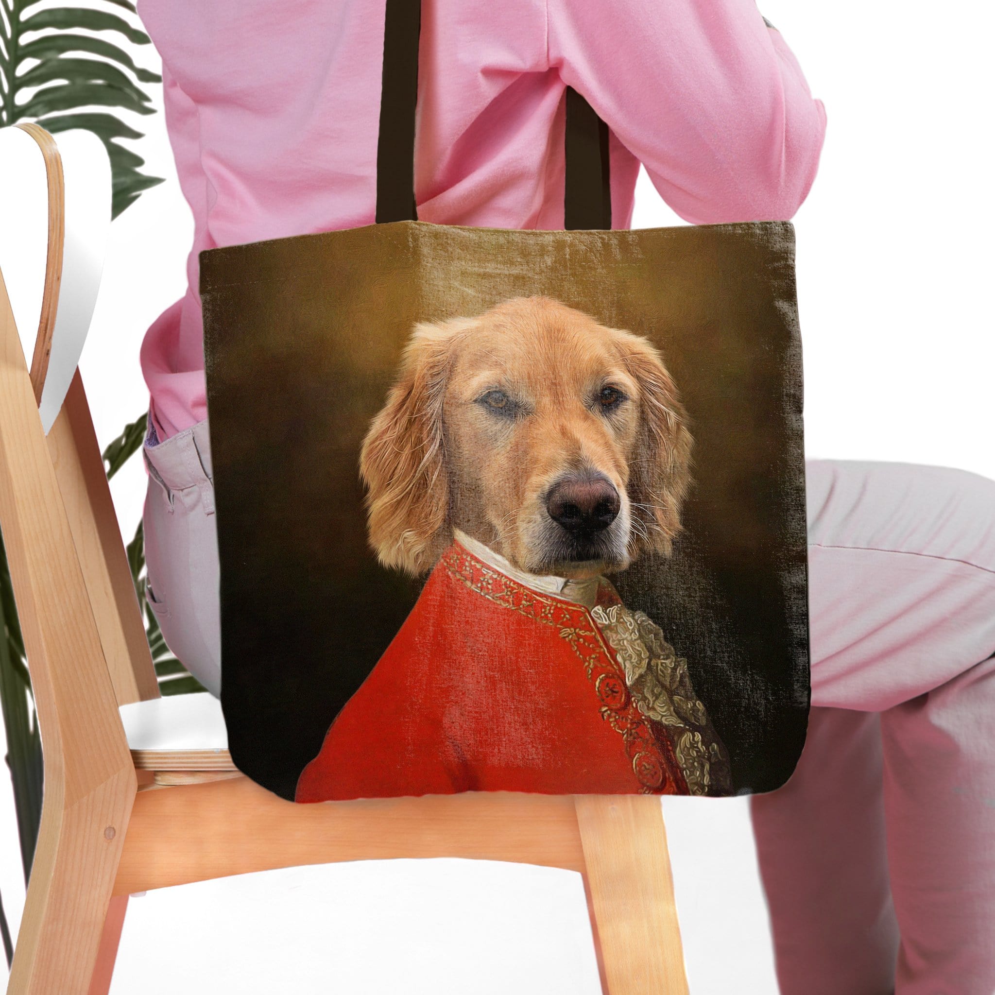 Personalized 'Pawzart' tote bag with a golden retriever pet portrait in a royal red renaissance costume.