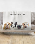 Personalized white blanket with watercolor portraits of four dogs and custom names.