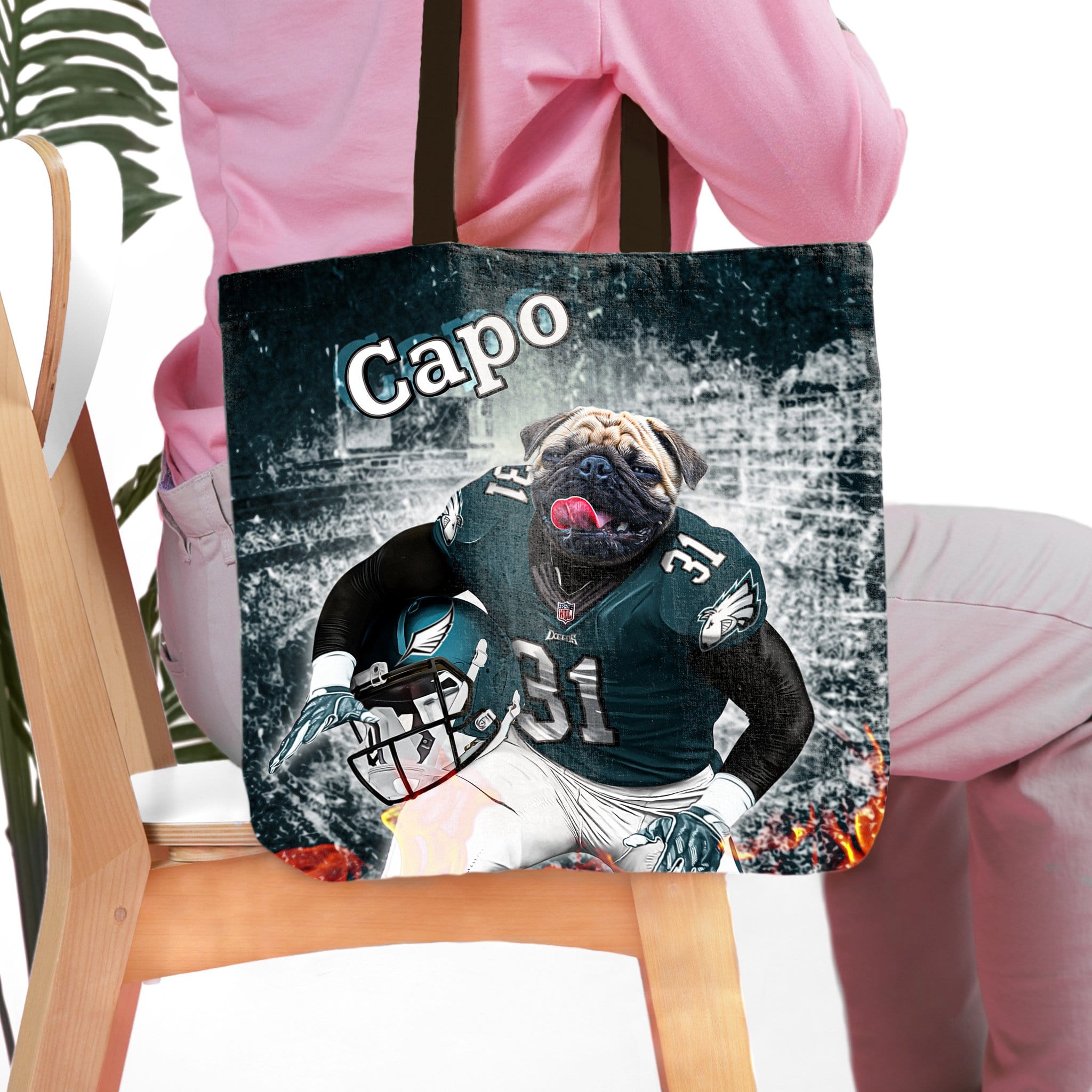 Personalized tote bag with a pug pet portrait in a Philadelphia Eagles football uniform.