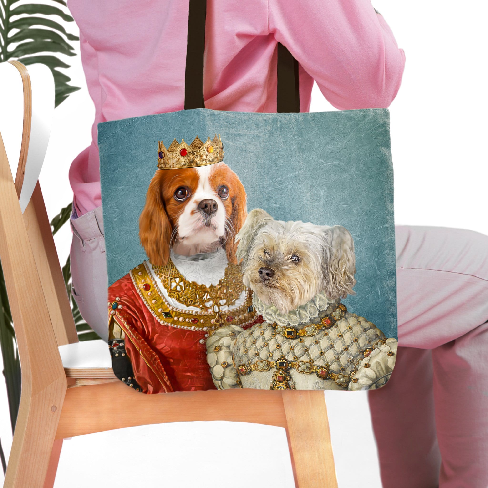 Personalized 'Queen and Princess' pet portrait tote bag featuring a Cavalier King Charles Spaniel and a Maltese.