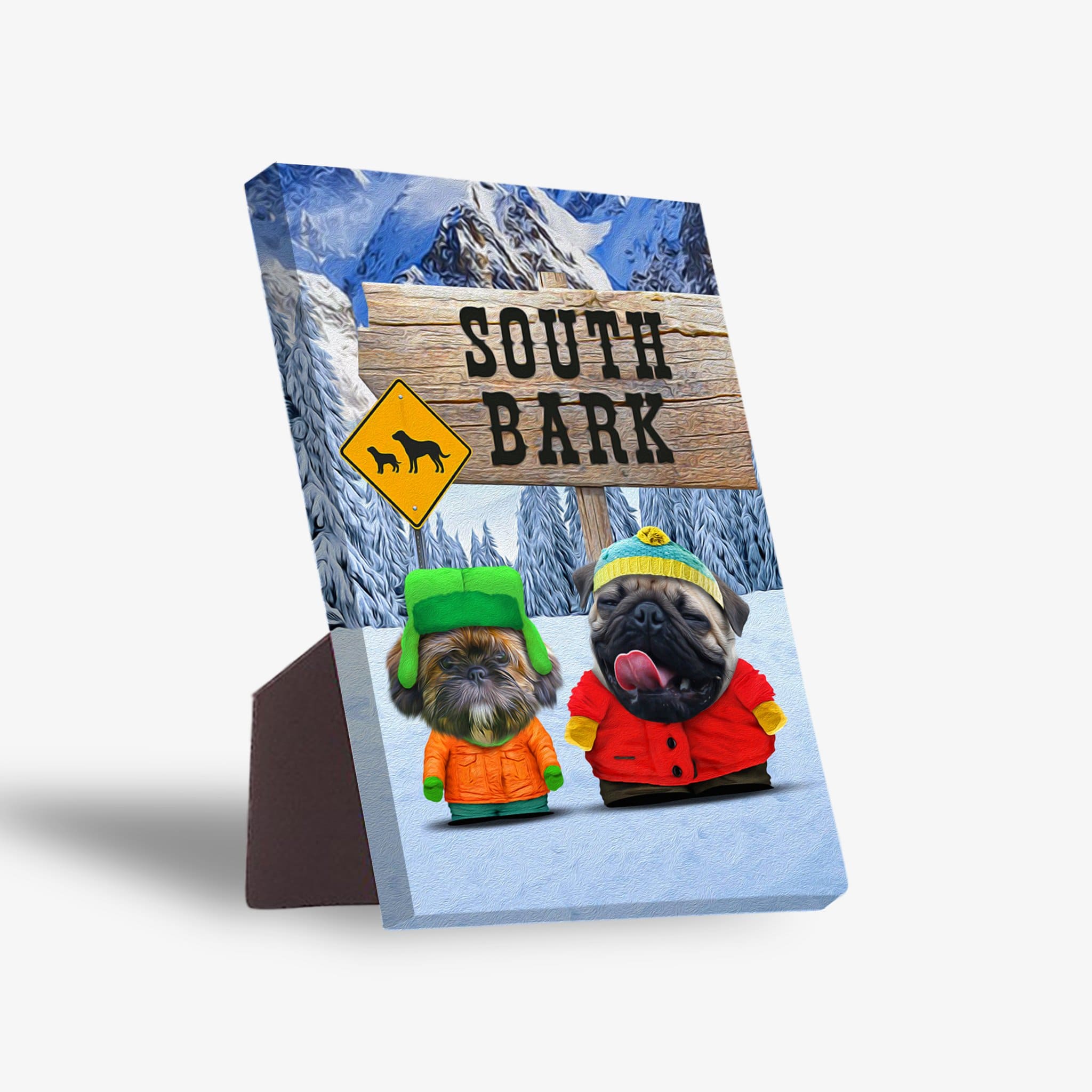 Personalized 'South Bark' standing canvas featuring two dogs in winter gear against a snowy mountain backdrop.