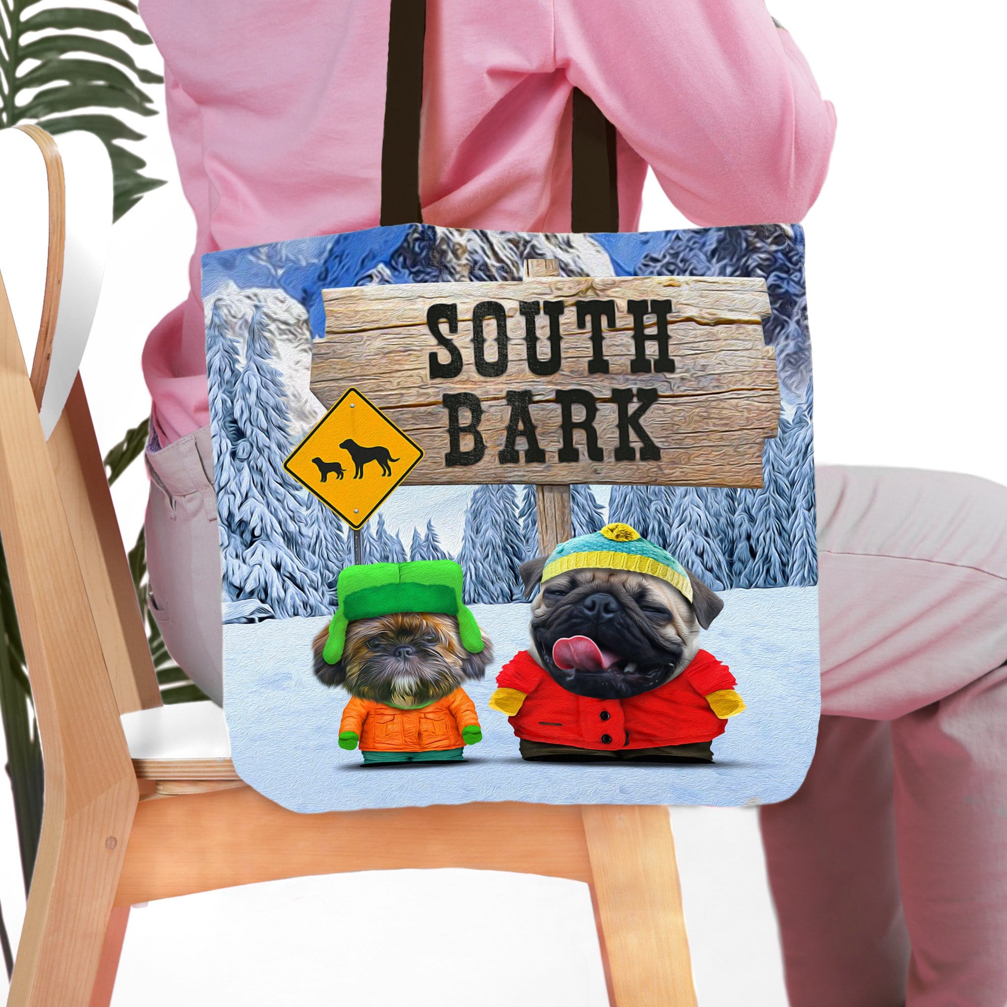 Personalized 'South Bark' 2 pet tote bag featuring custom dog portraits in a snowy landscape.