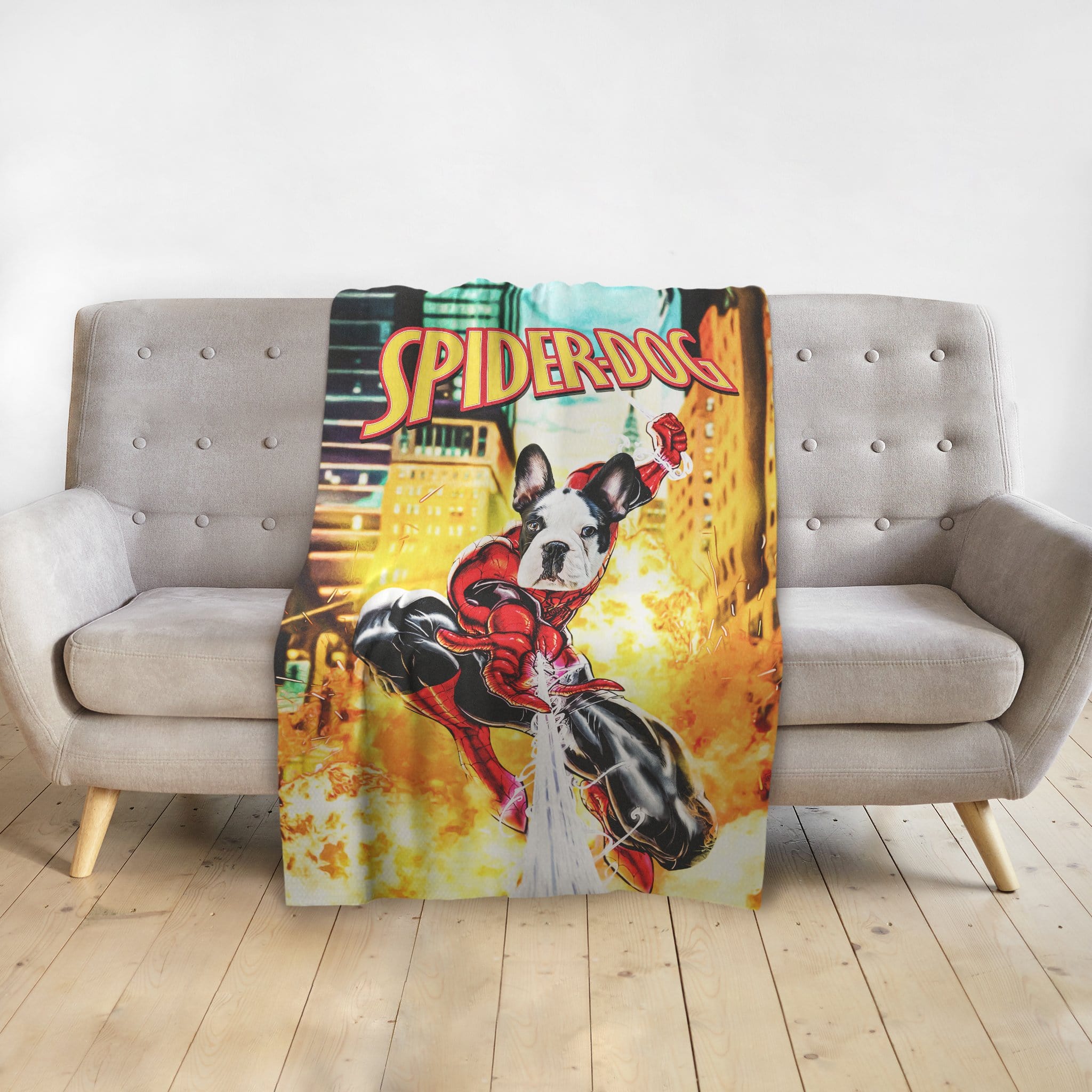 Personalized Spider-Dog pet blanket featuring a French Bulldog superhero portrait on a gray sofa.