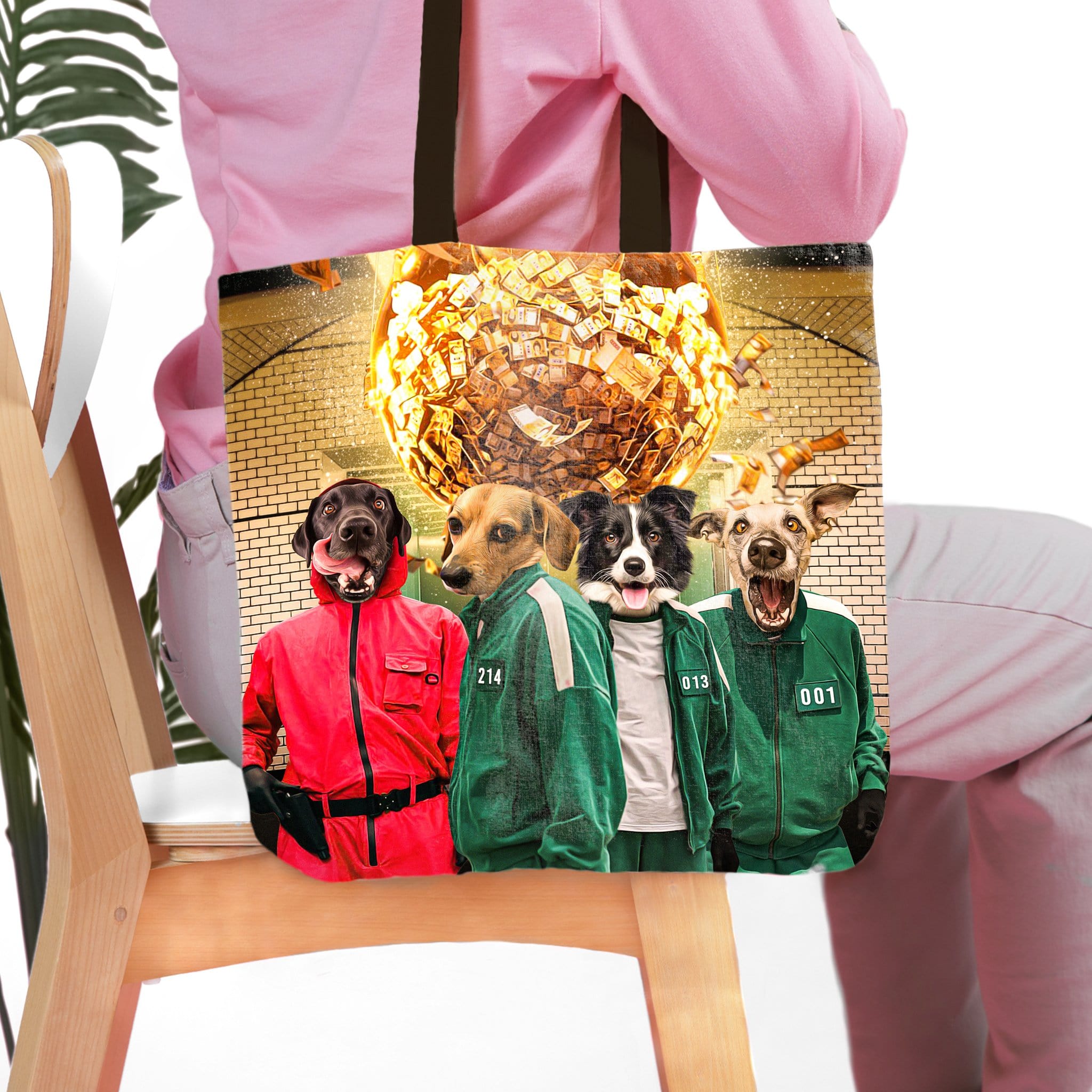 Personalized 'Squid Paws' 4-pet tote bag with dogs in red and green costumes.