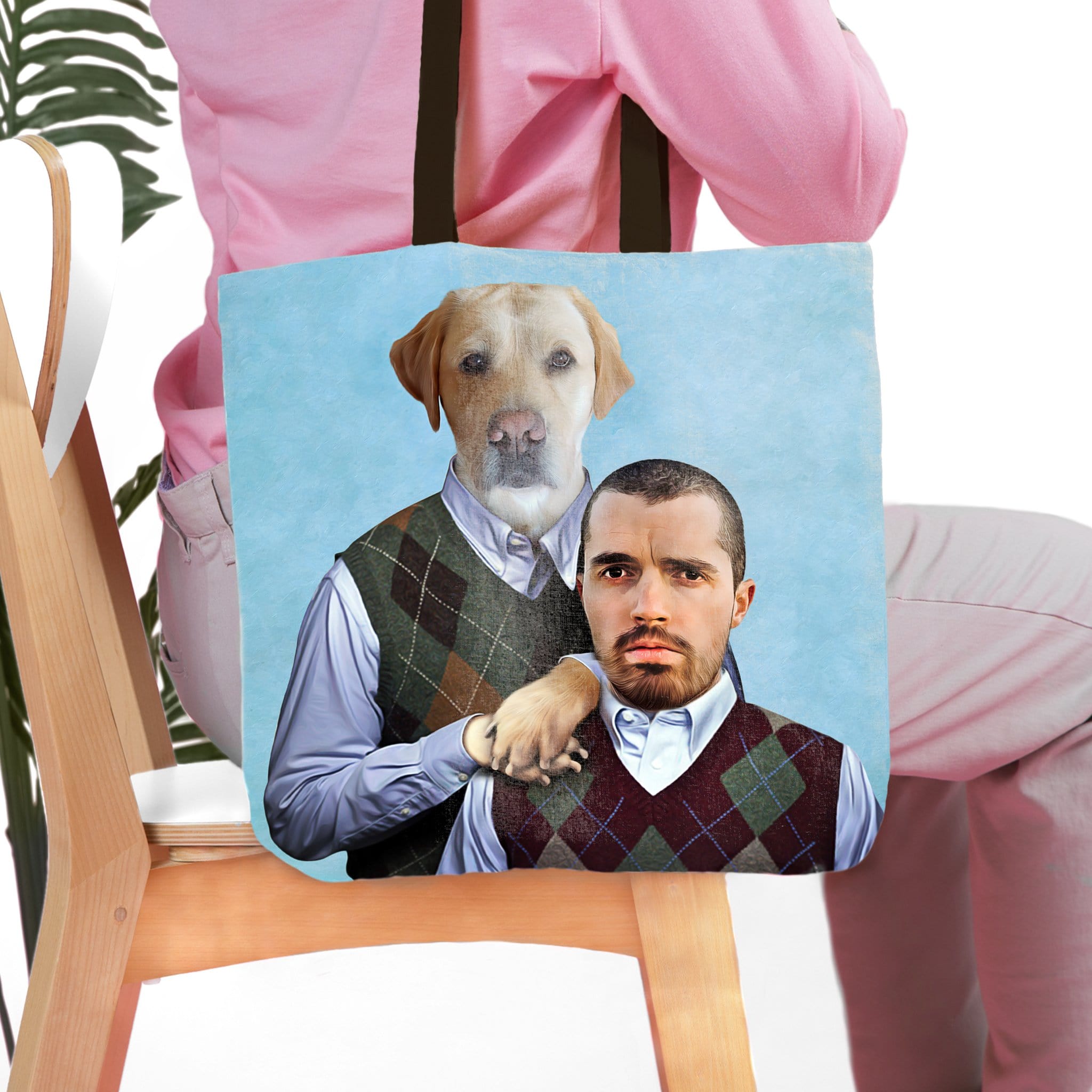 Personalized tote bag featuring a custom portrait of a human and a yellow lab dog in matching argyle vests.