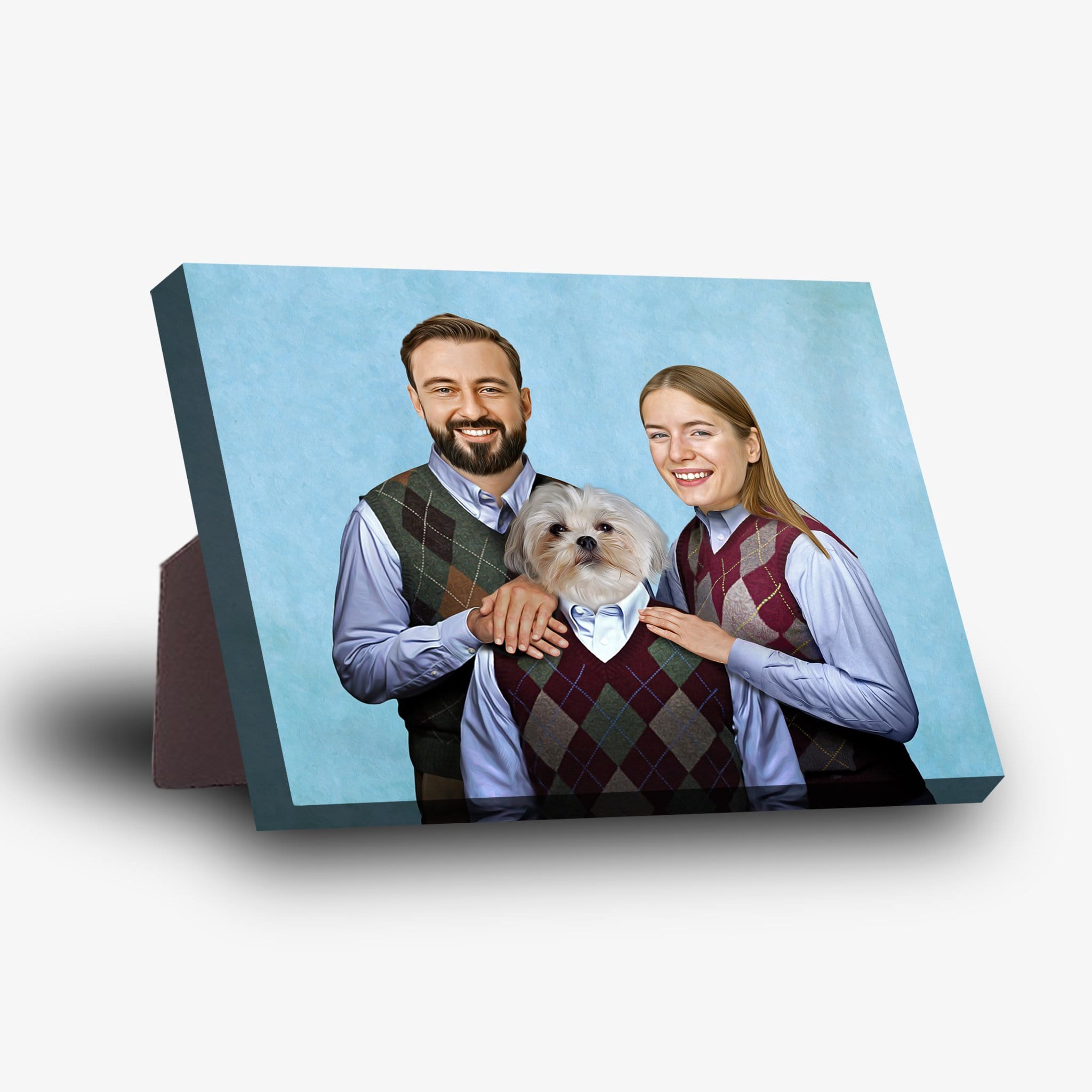 Personalized standing canvas featuring a smiling couple and their dog wearing argyle sweaters on a light blue background.