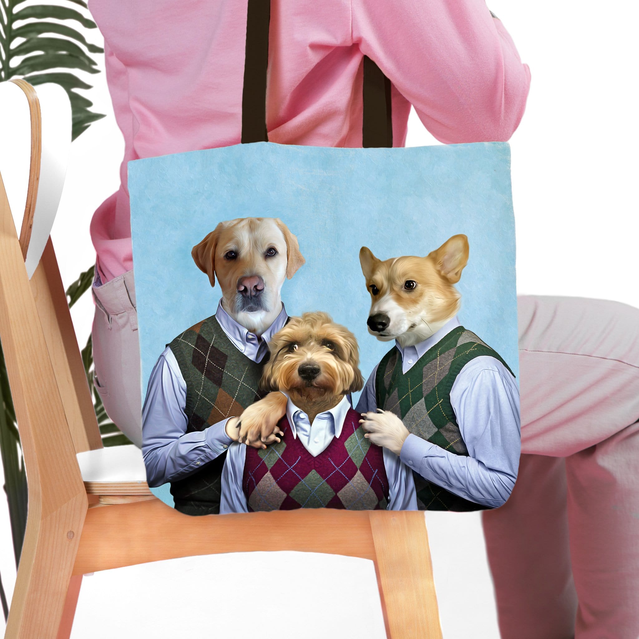 Personalized 3-pet tote bag with dogs in renaissance-style clothing against a blue background.