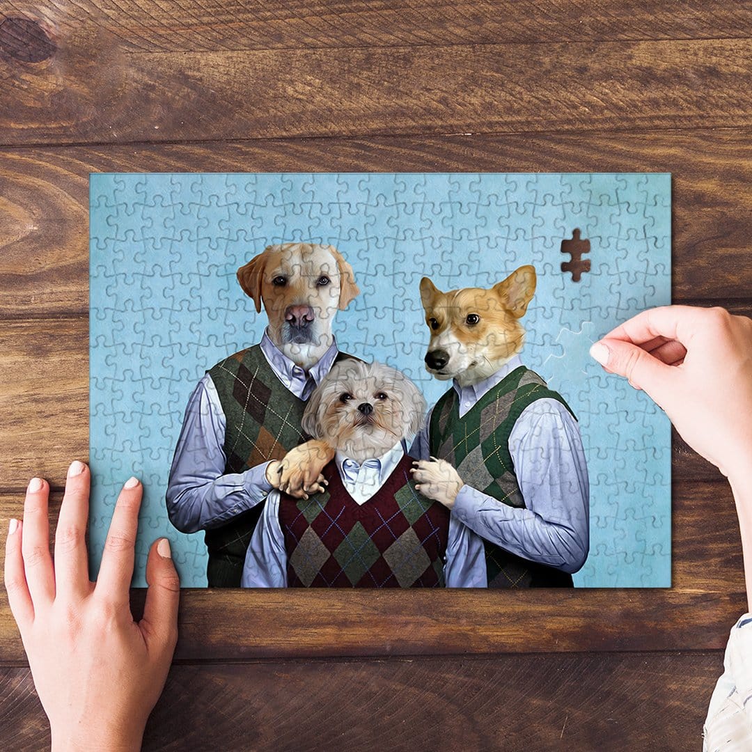 Personalized 3-pet puzzle featuring dogs in argyle sweaters, with a hand placing the last piece.
