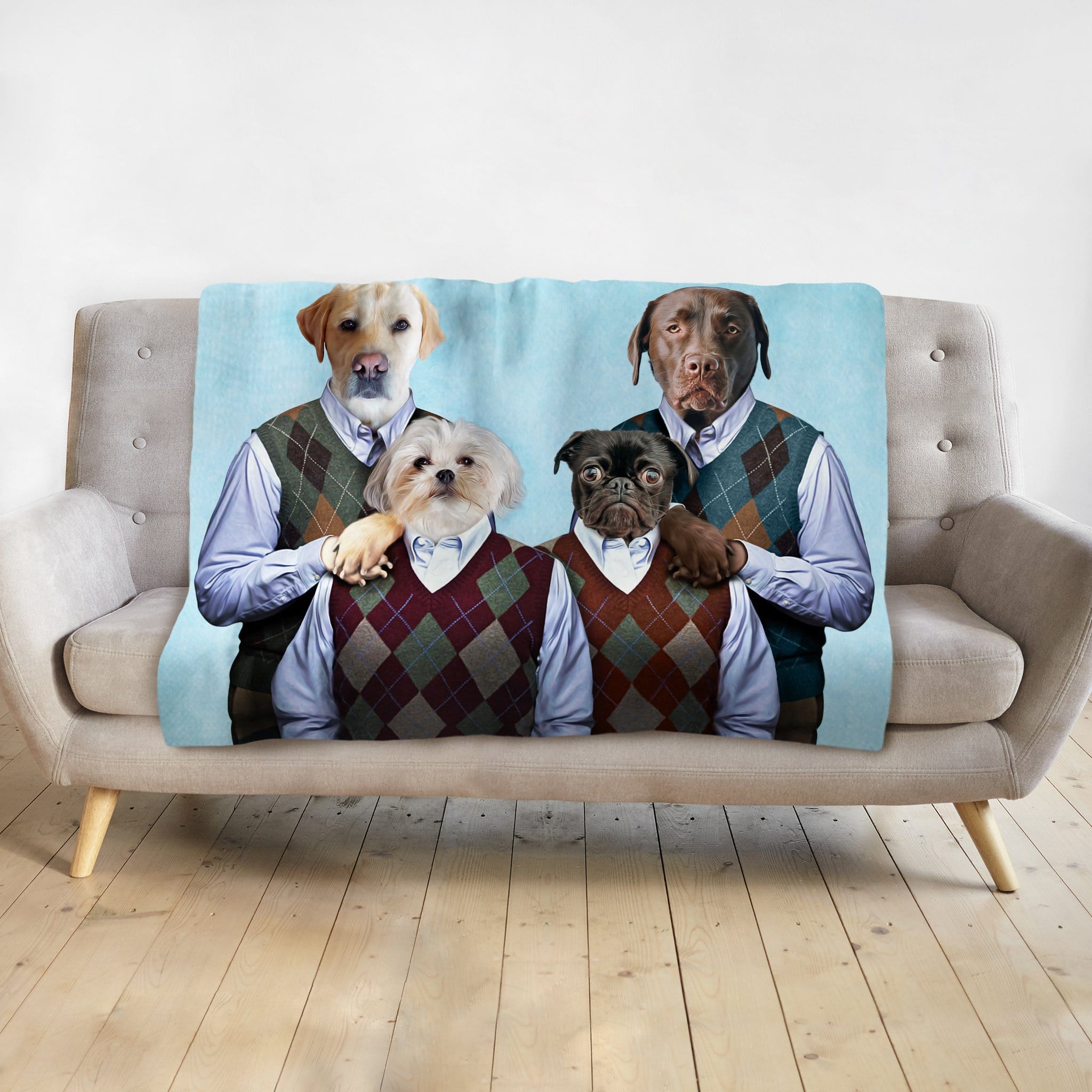 Personalized Doggovinci portrait blanket featuring four dogs in argyle sweaters on a light blue background.