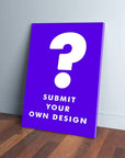 Purple canvas print with a large white question mark and "SUBMIT YOUR OWN DESIGN" text, leaning on a wall.