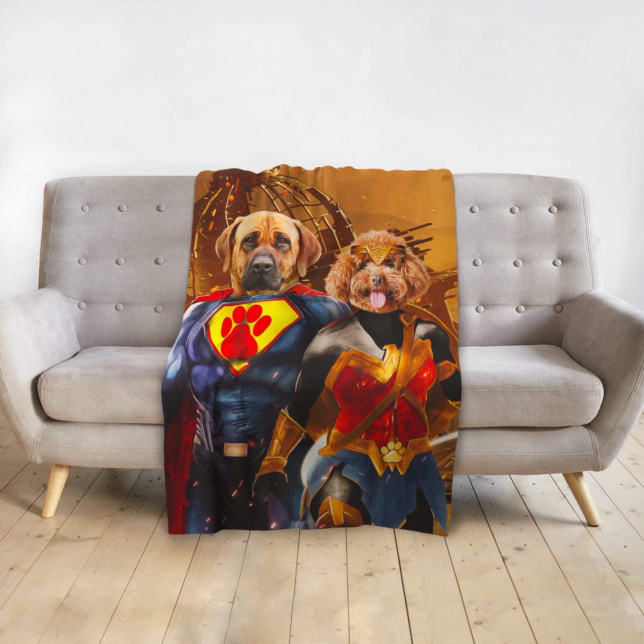 Personalized custom blanket with two dogs as superhero portraits, a brown dog as Superman and a poodle as Wonder Woman.