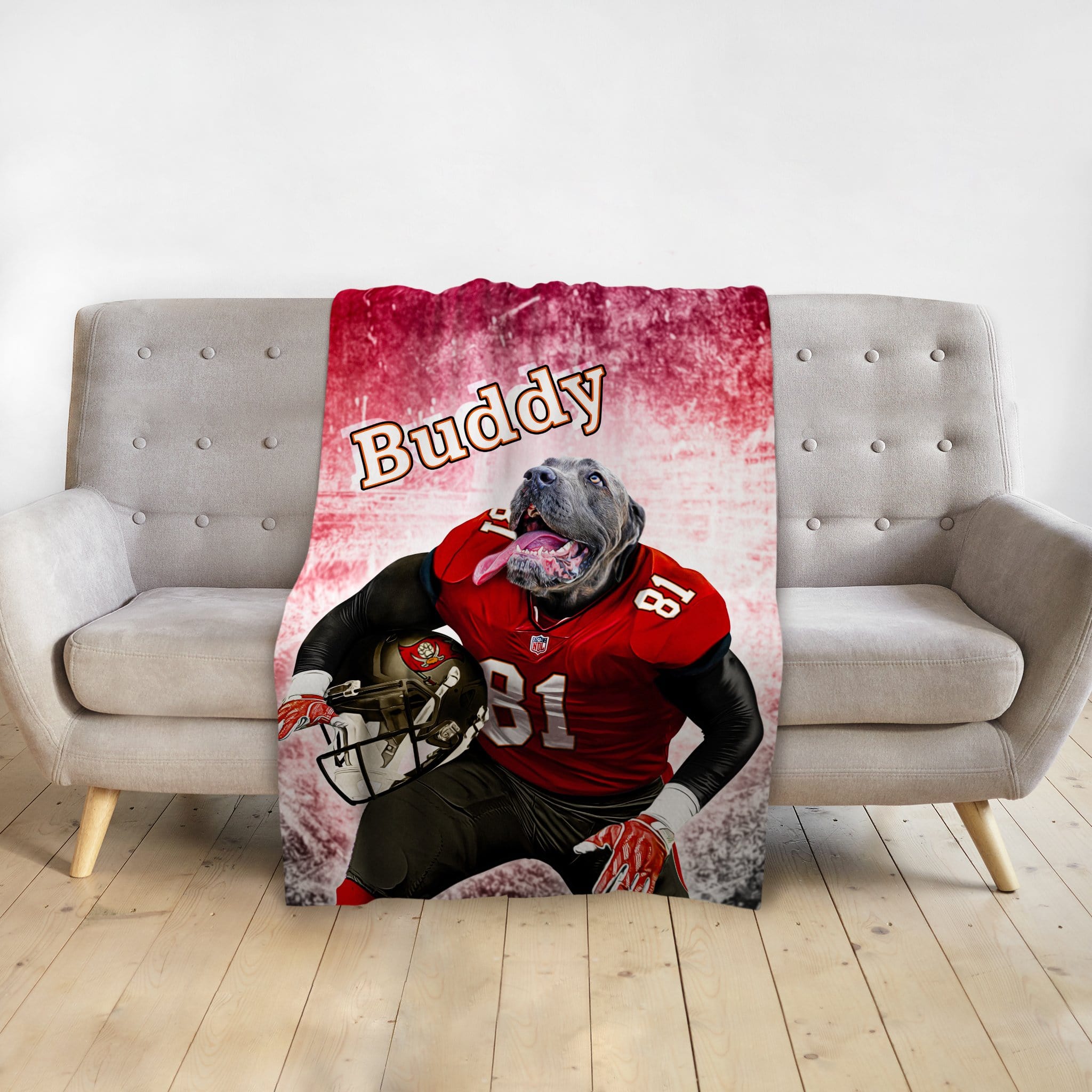 Personalized pet blanket with a gray dog in a red football uniform, named Buddy.