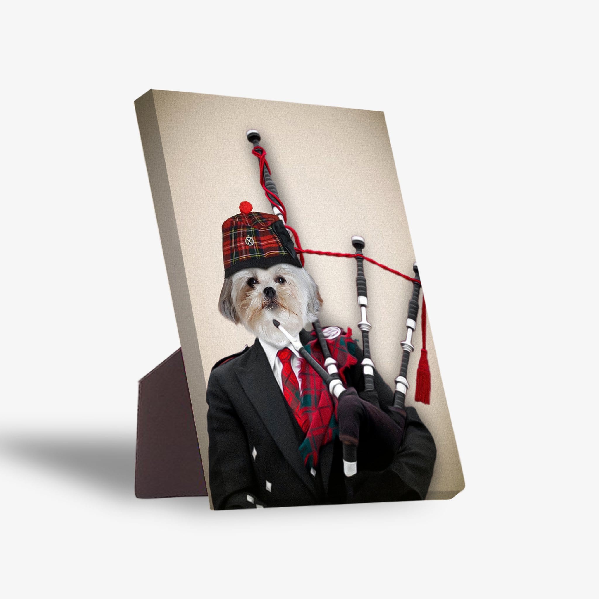 Personalized Shih Tzu pet portrait on a standing canvas, dressed as a bagpiper in a black suit with a red tartan tie and hat.