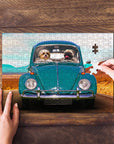 Personalized 2 pet puzzle featuring two dogs in a teal Beetle car, with a hand placing the last piece.