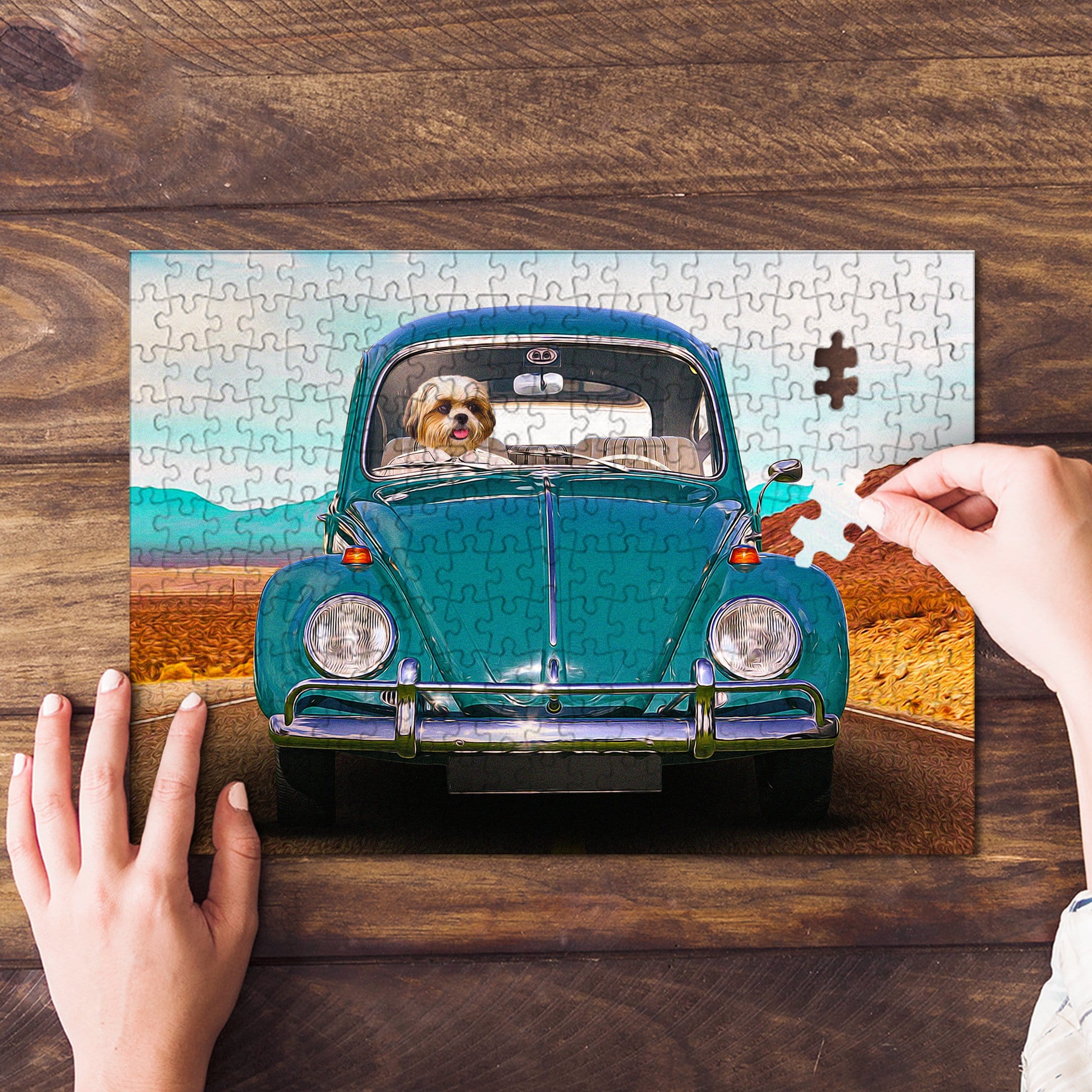 Personalized pet puzzle featuring a dog in a teal vintage Beetle car, with a hand placing the last piece.