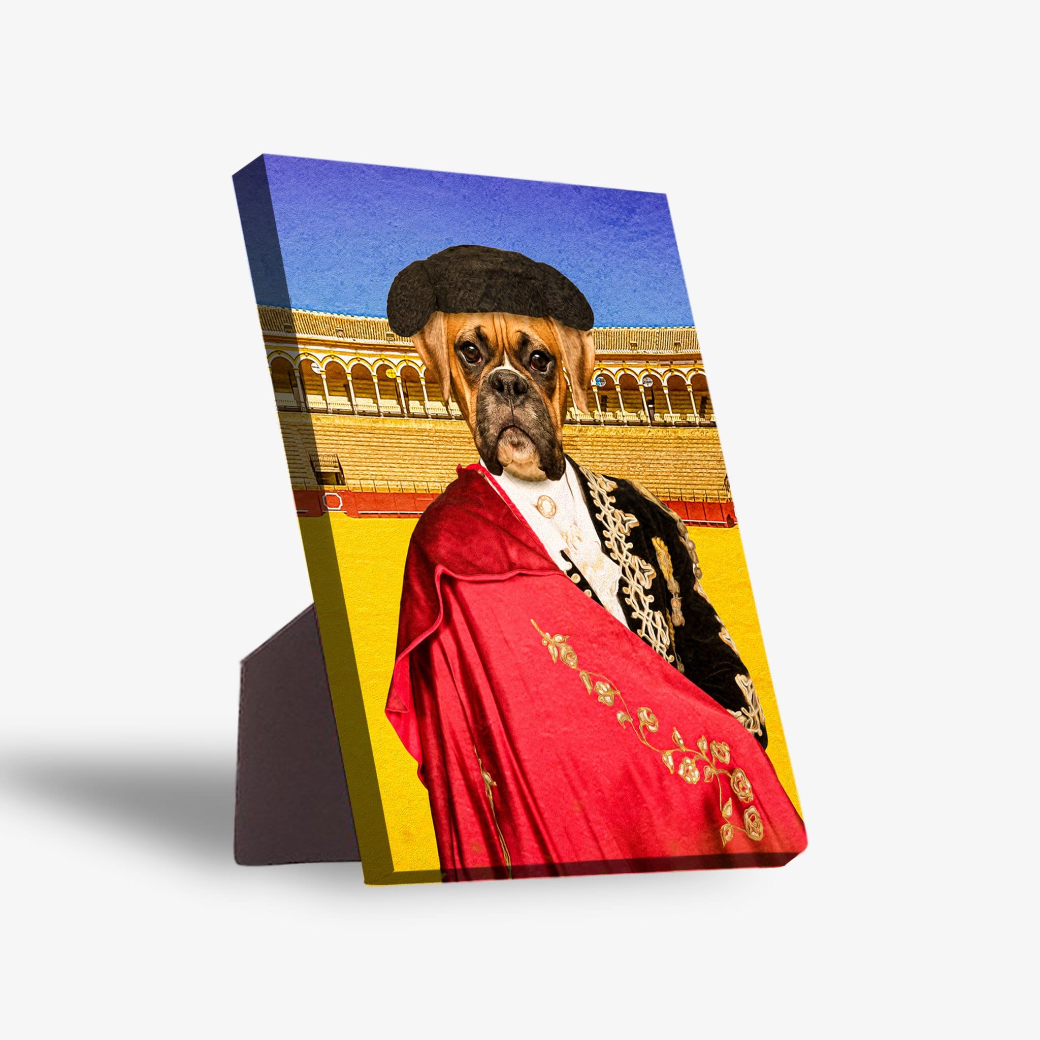 Personalized Boxer pet portrait on a standing canvas, dressed as a bullfighter with a red cape and black hat.