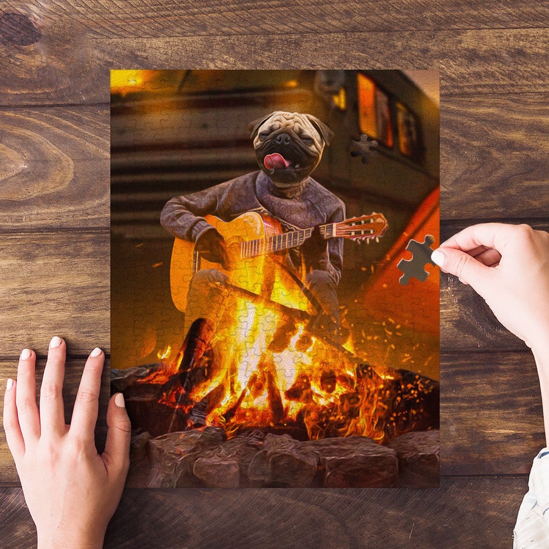 Personalized pet puzzle featuring a pug playing guitar by a campfire, with hands assembling it.
