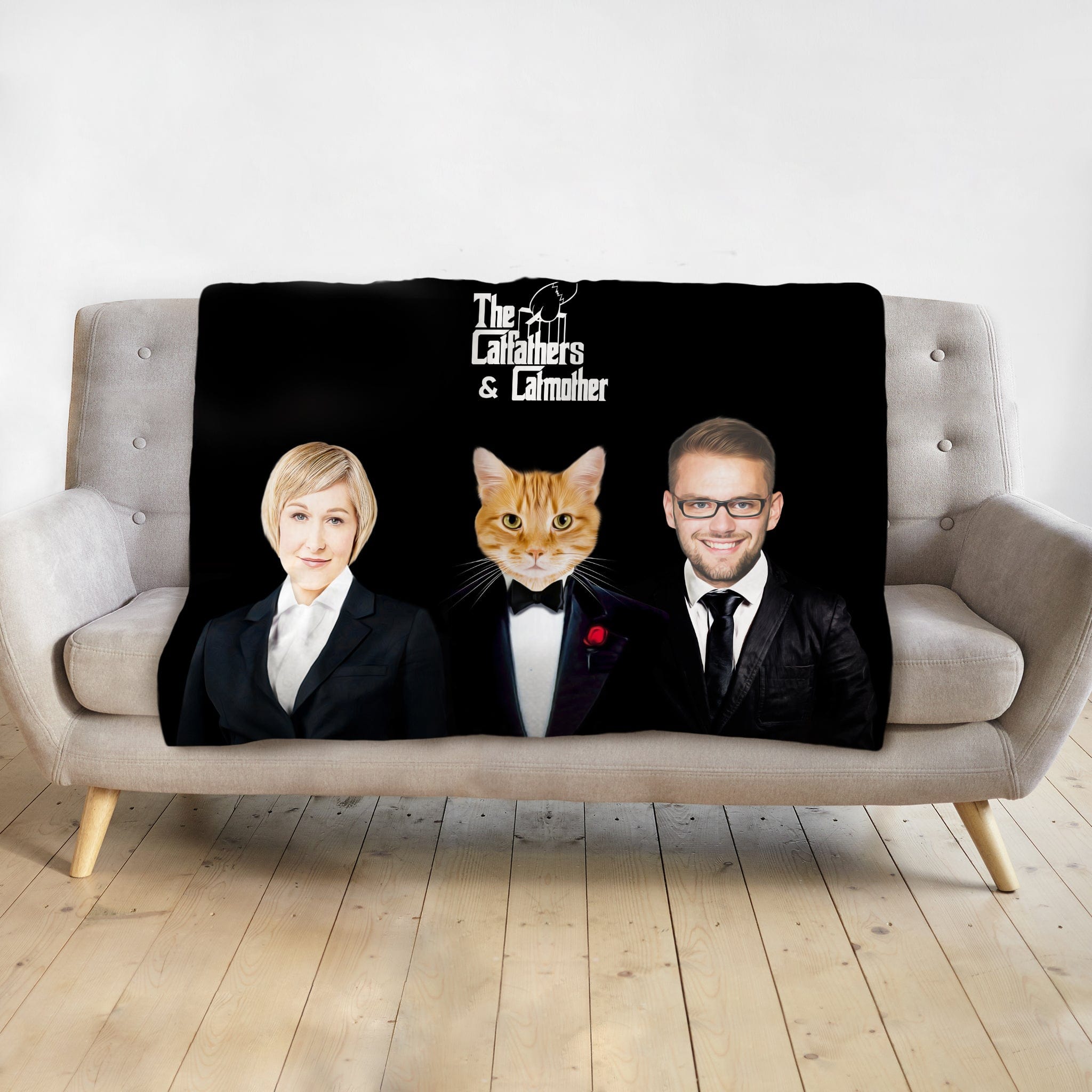Custom black blanket with "The Catfathers & Catmother" text, featuring personalized portraits of a woman, an orange cat in a tuxedo, and a man.