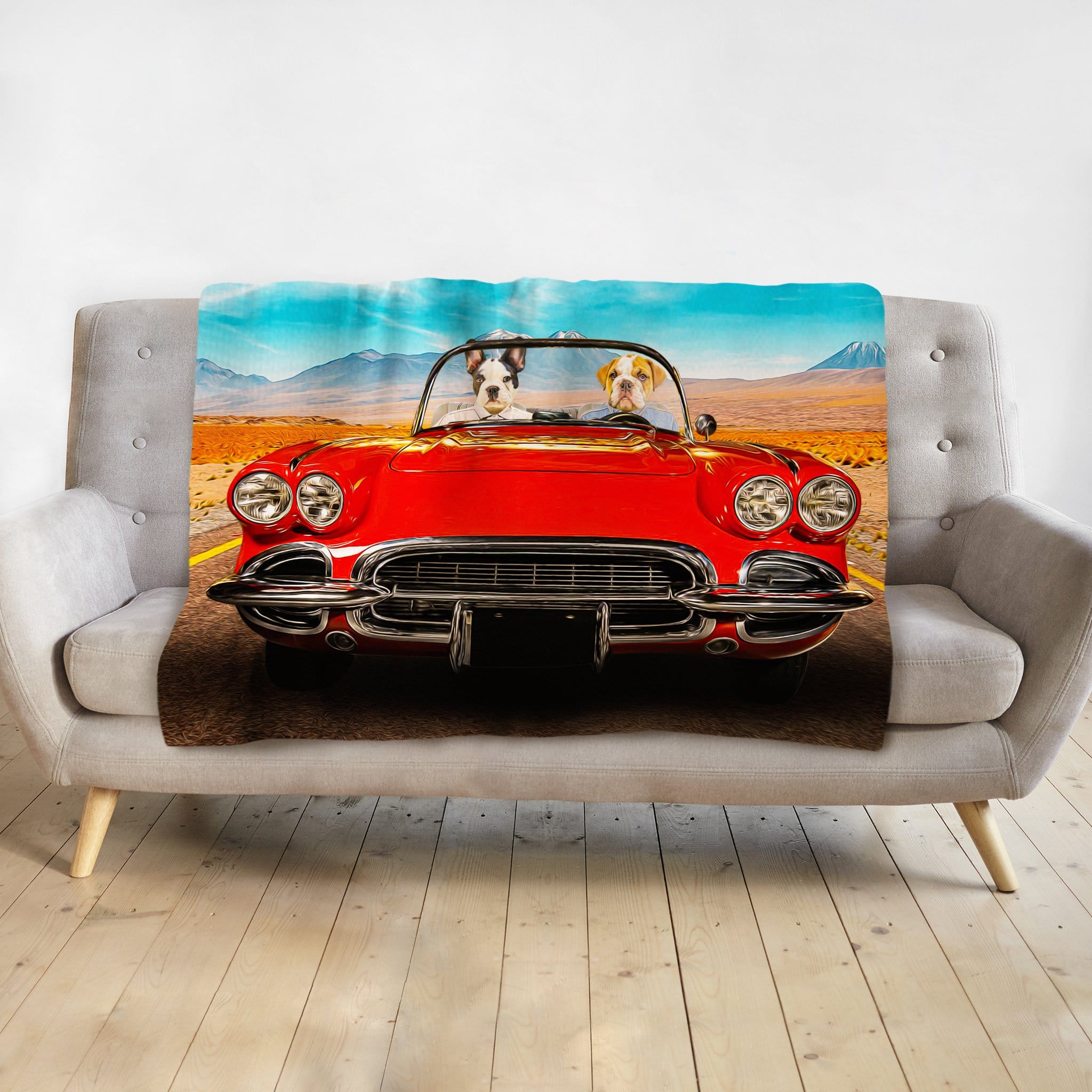 Personalized pet blanket with two dogs in a red classic car on a desert road.