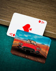 Personalized playing cards featuring custom pet portraits in a red classic car on a desert road.