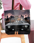 Personalized black tote bag with four dog portraits in a classic car, city background.