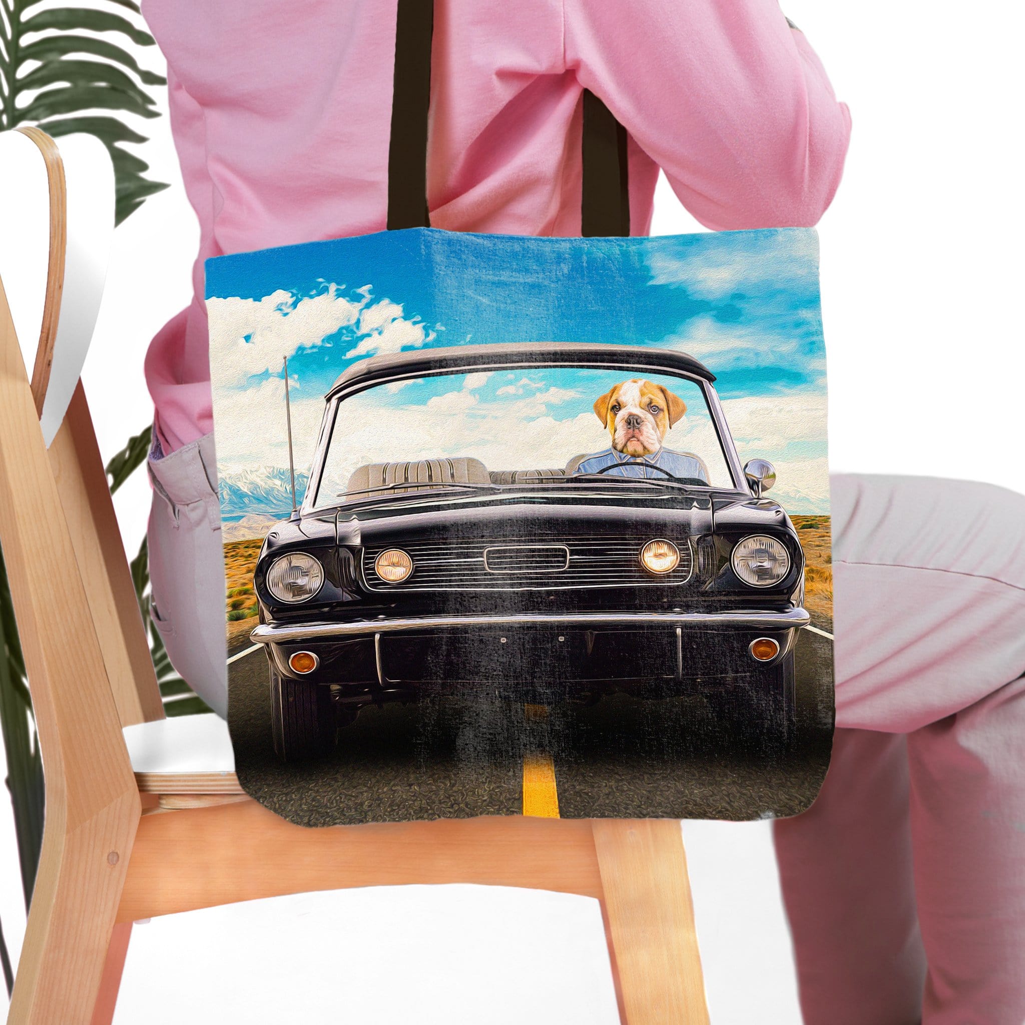 Personalized tote bag with a custom pet portrait of a bulldog driving a classic black convertible car.