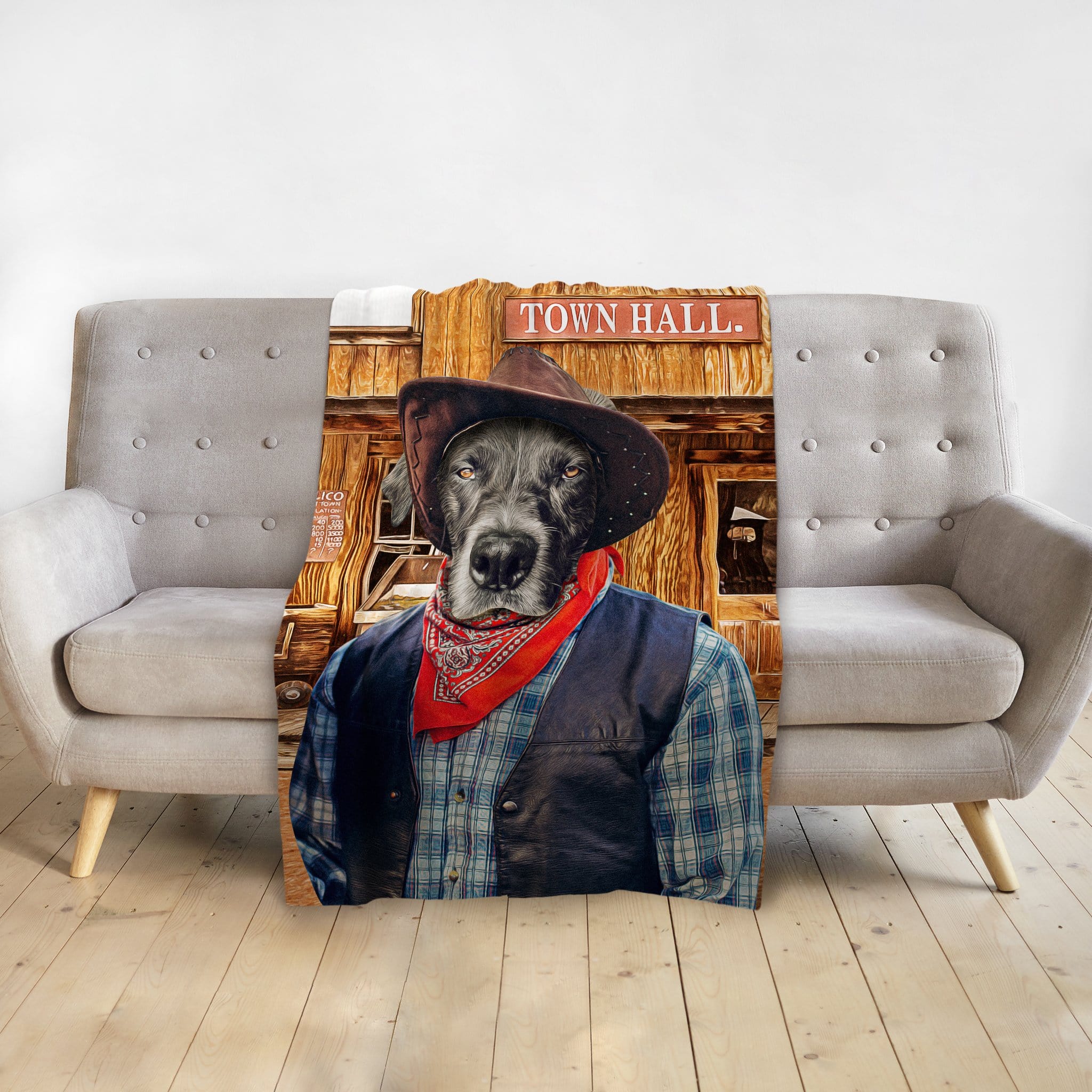 Personalized pet blanket with a black dog in a cowboy hat and bandana, standing in front of a wooden town hall.