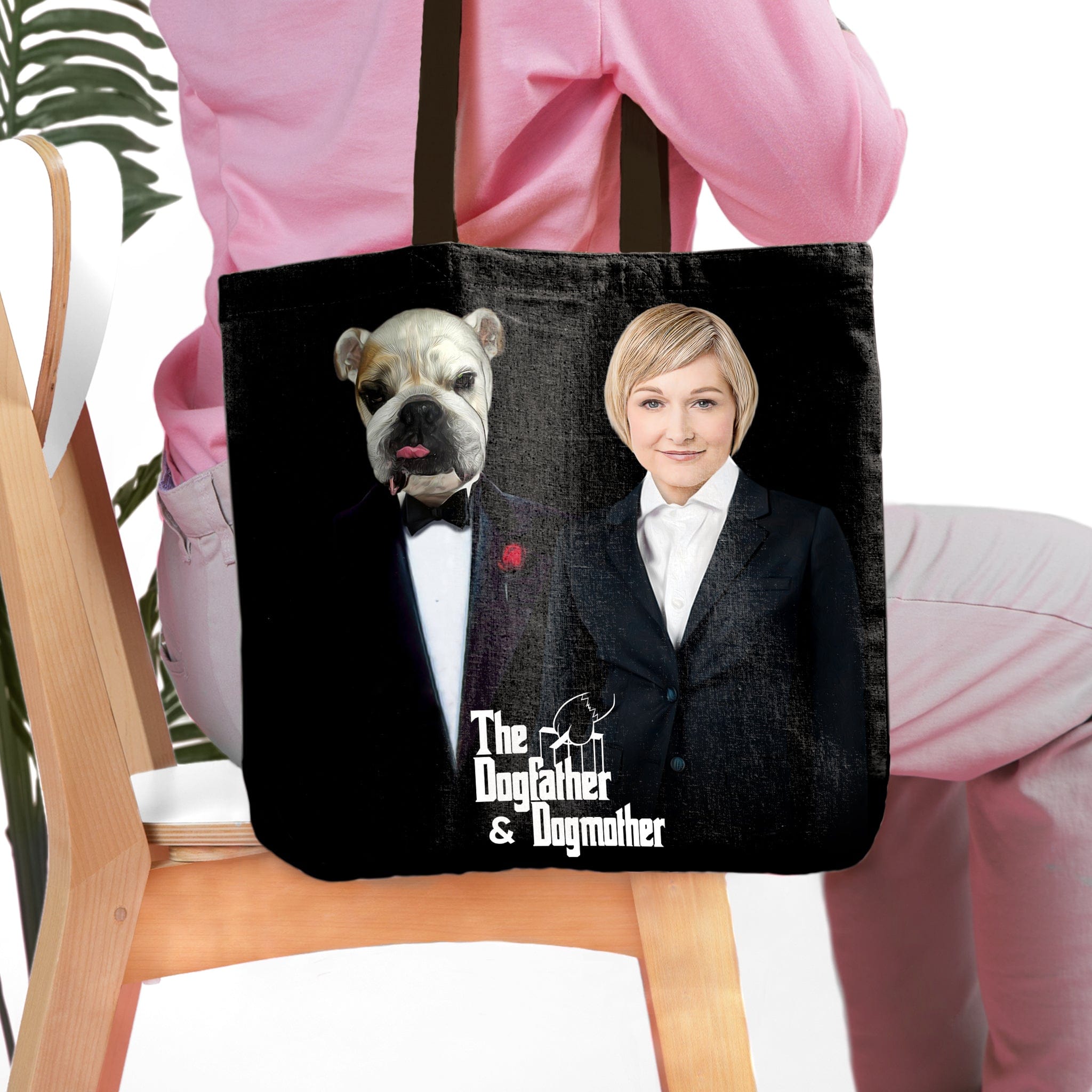 Black personalized tote bag with custom "Dogfather & Dogmother" pet and human portraits.