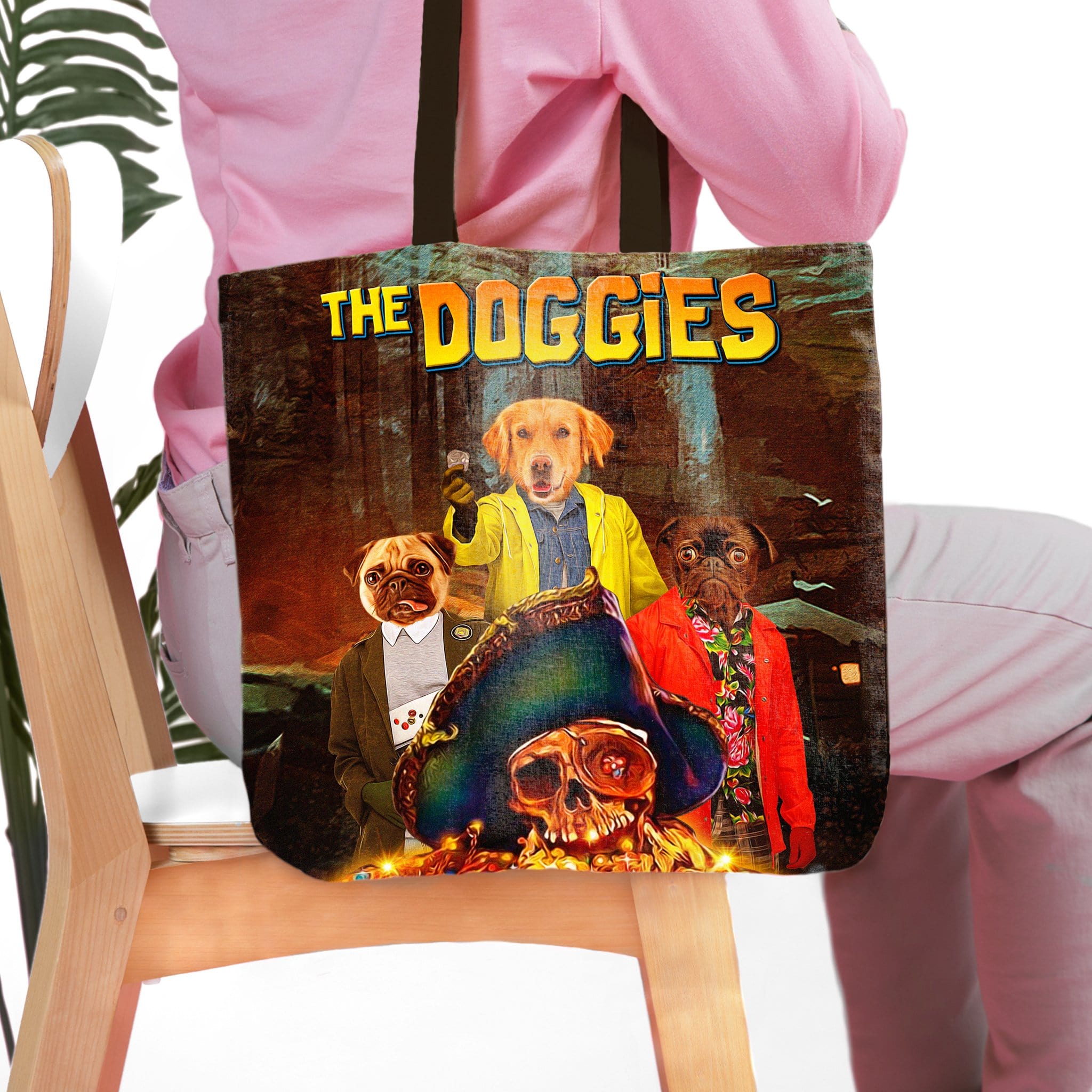Personalized 'The Doggies' tote bag featuring three custom pet portraits in a movie poster style.